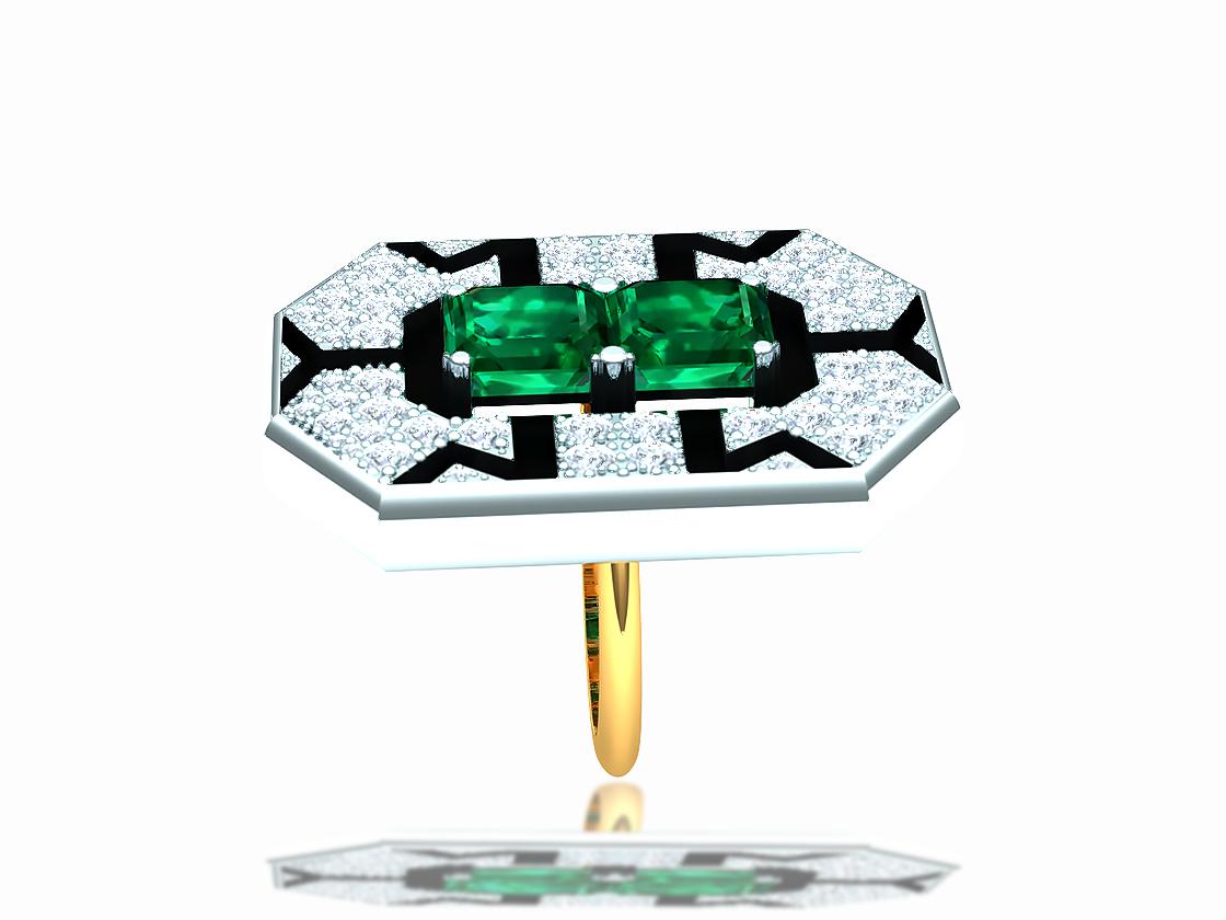 A classic egyptian revival style deco design.  This ring consist of two gorgeouse octagon cut emeralds each weighing apprx. 1.5 carats and display a rich green color and good clarity.  The emerald stones are surrounded by a black and bold division