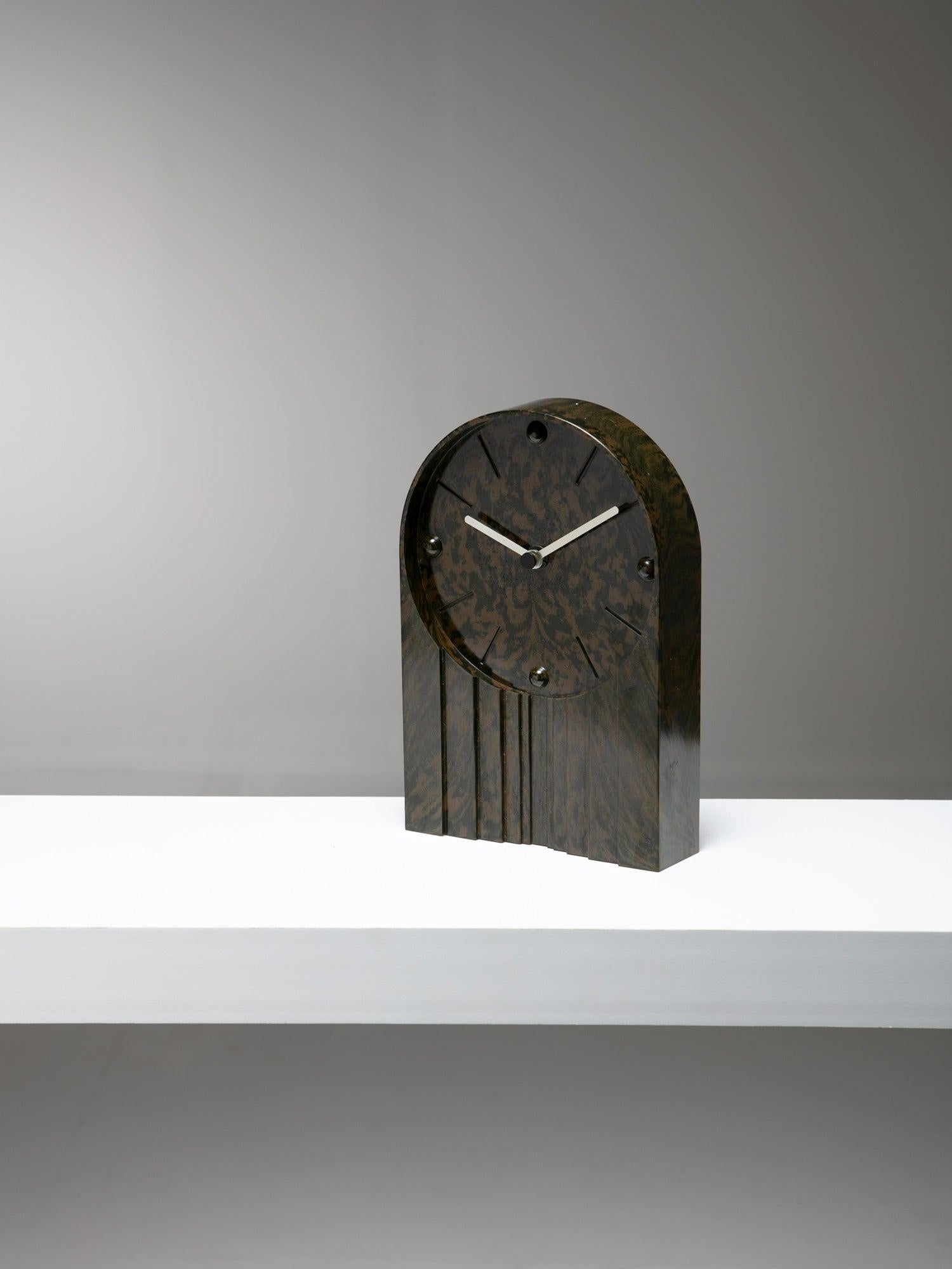 Unusual table clock with Deco shape and bakelite surface pattern