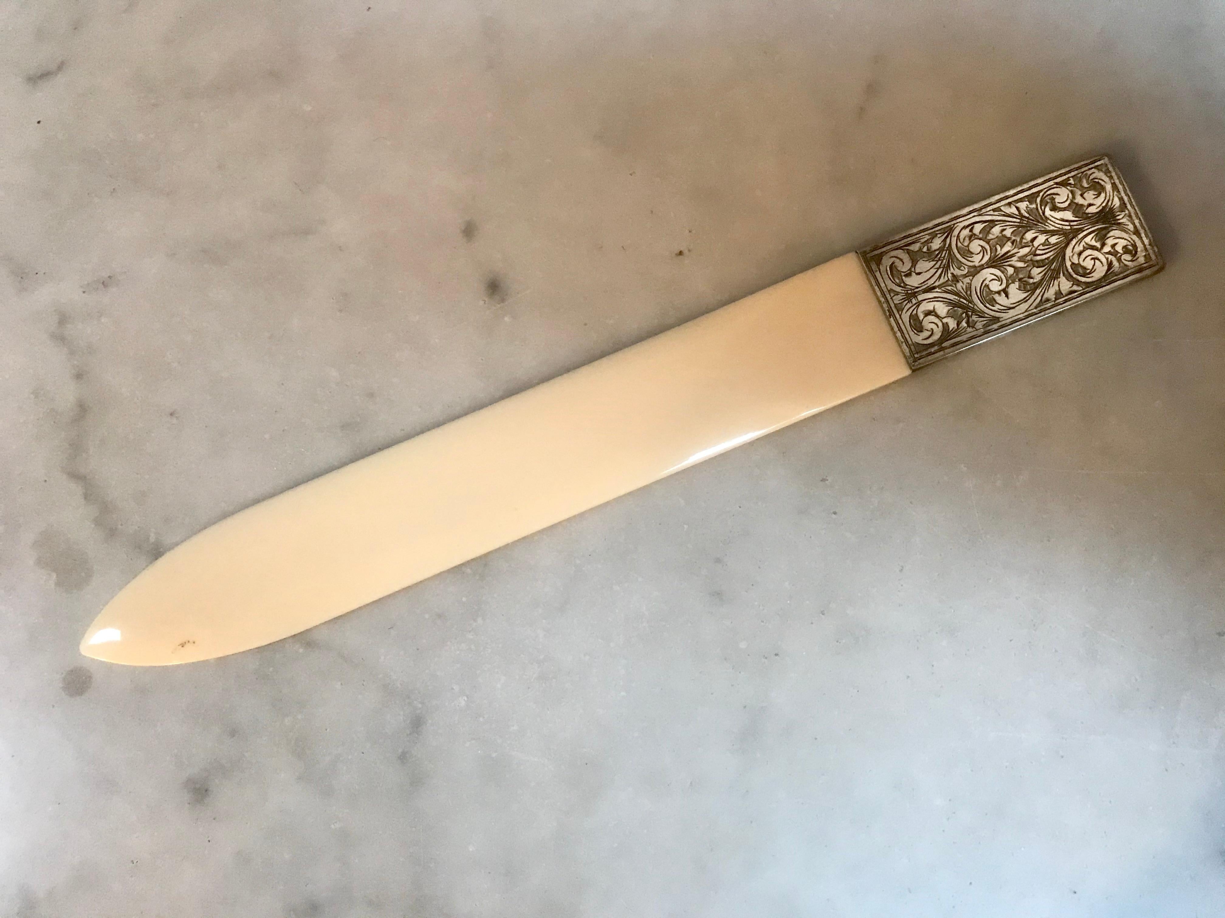 Bone and silver letter opener. Vintage bone and sterling silver letter opener in a simple, 1930s.