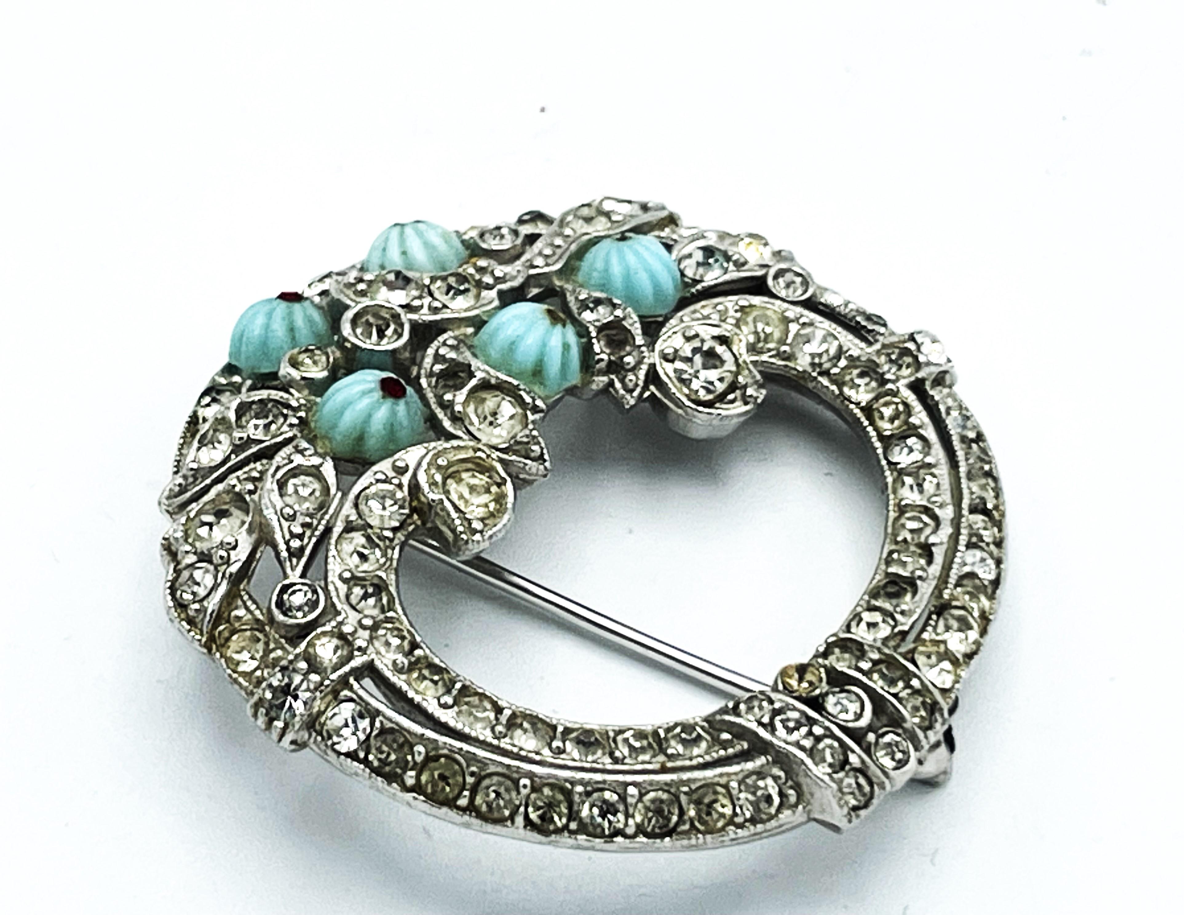 Mixed Cut Deco Brooch in the shape of a circle, set with small rhinestones, USA 1940s  For Sale