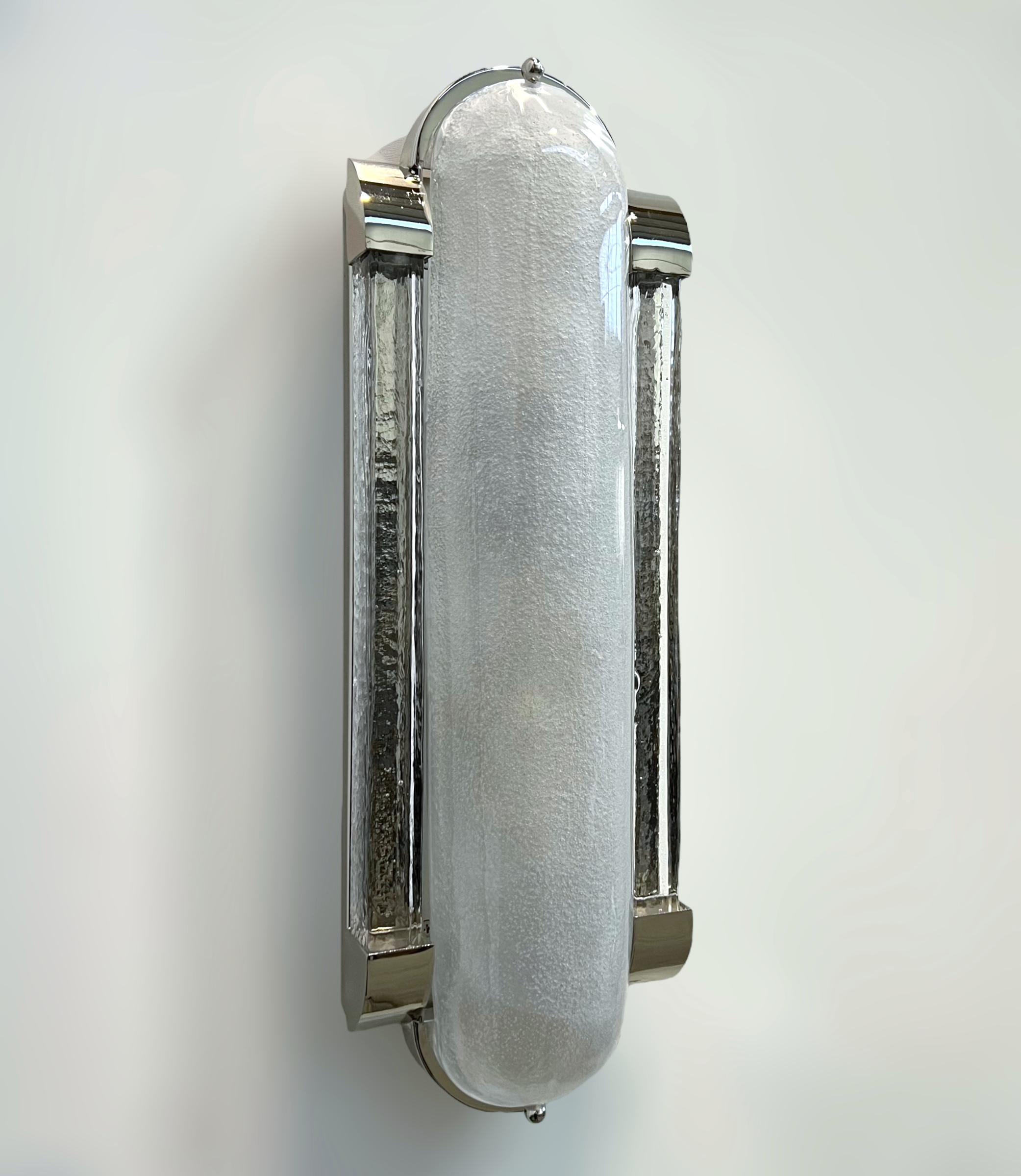 Italian Art Deco style wall light or flushmount with frosted Murano glass mounted on polished nickel frame with a full backplate / Designed by Fabio Bergomi for Fabio Ltd / Made in Italy
Measures: Height 18.5 inches, width 6.5 inches, depth 3