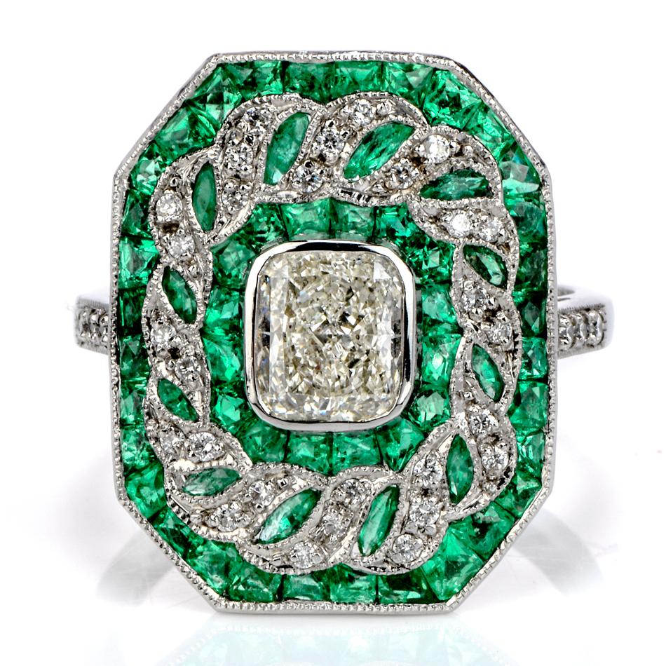 Gaze into this absolutely stunning GIA Estate Diamond & Emerald Radiant Platinum Ring. The 1.01 radiant cut, J color, VS1 clarity, has noticeable very good polish and symmetry. The sparkling facets will take you to another dimension with its