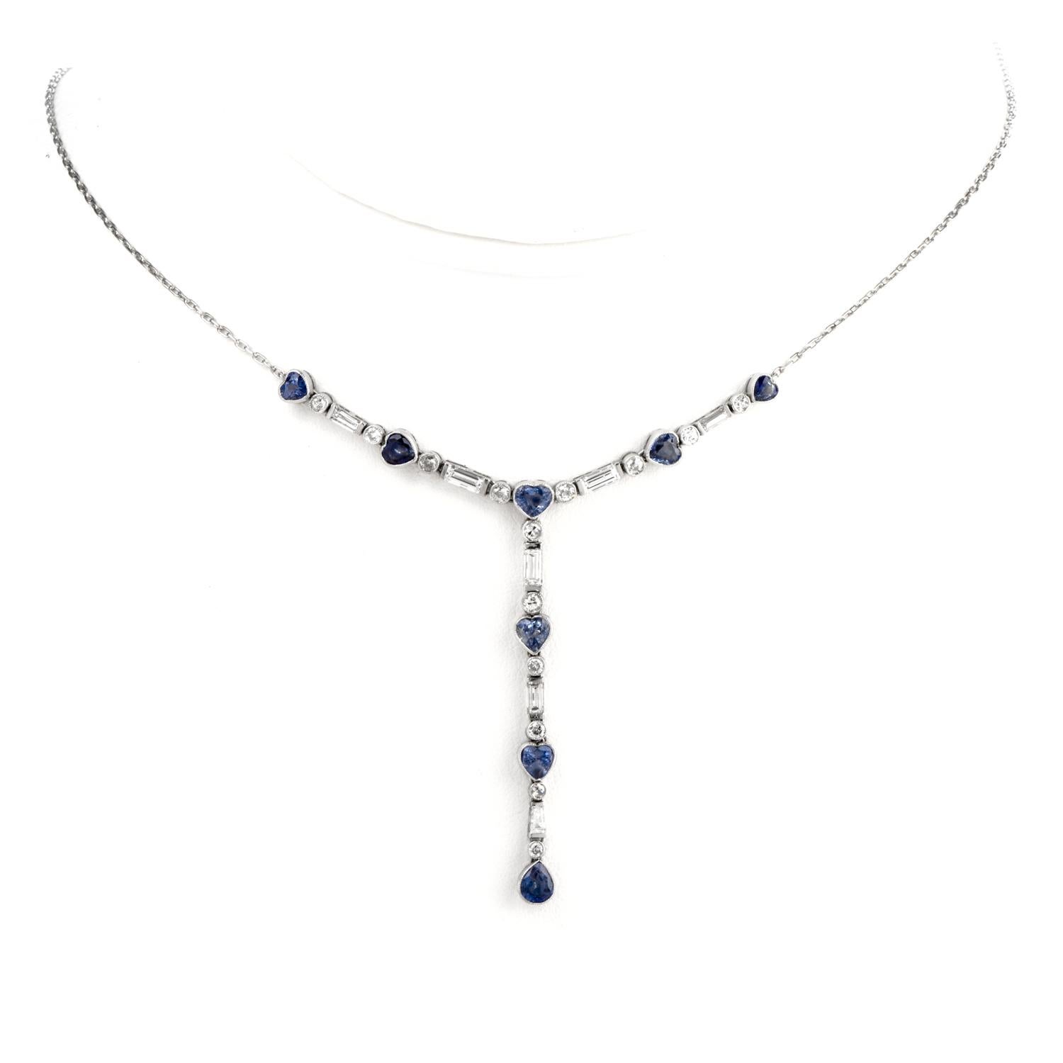 This Playful yet Romantic Diamond and Tanzanite necklace was inspired

in a Y necklace design and crafted in Platinum.

Heart shaped Tanzanite adorn throughout and weigh

approximately 2.00 carats.

Diamonds weigh approximately 2.20 carats and are