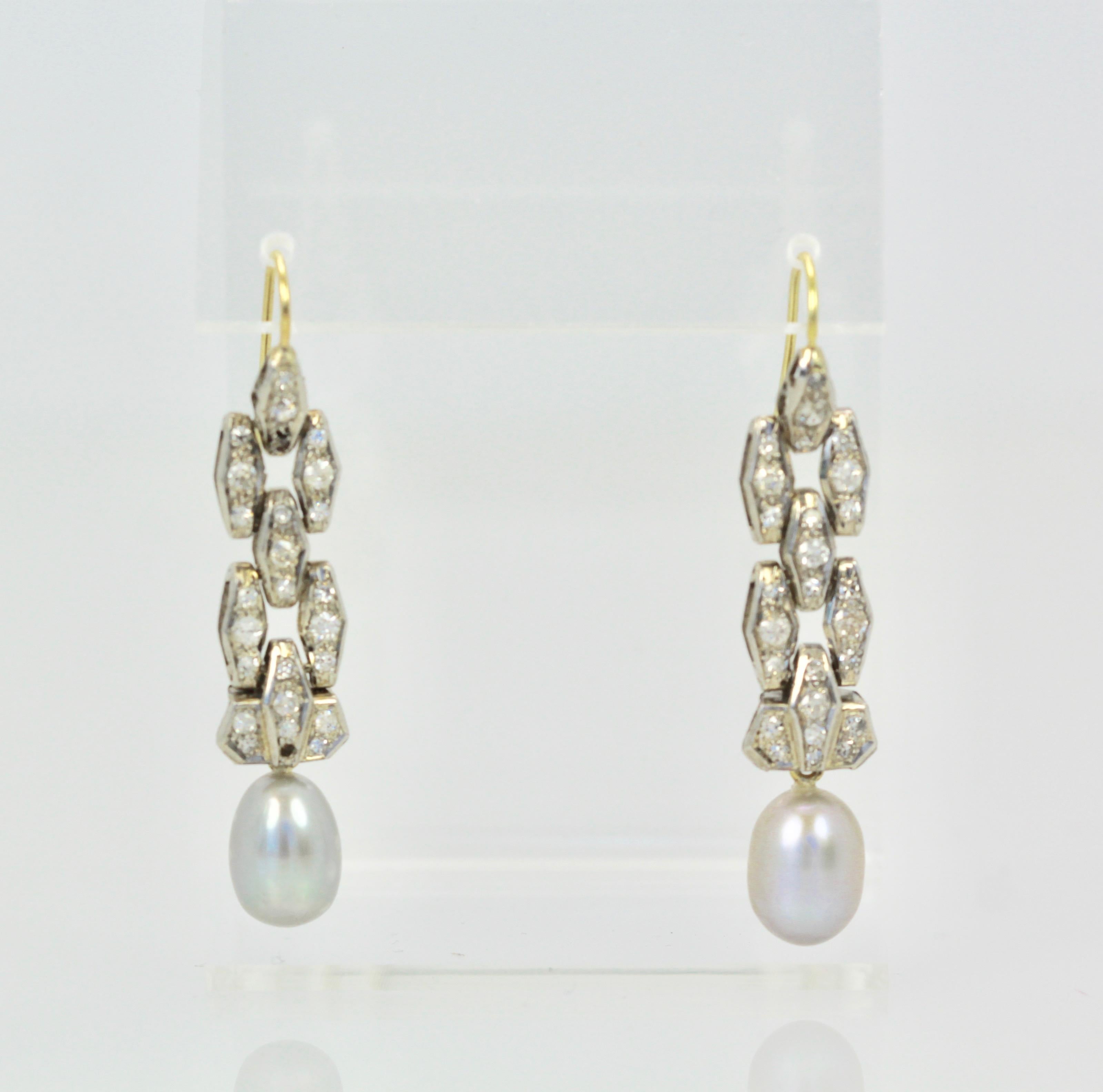These lovely Deco Diamond Pearl Drop earrings come from Ireland and are 1 cm wide x 4.5 cm long.  The Diamonds remind me of an old Deco bracelet or parts from one, but I purchased these as is.  The pearls are 1.2 cm long and one is with a light tint