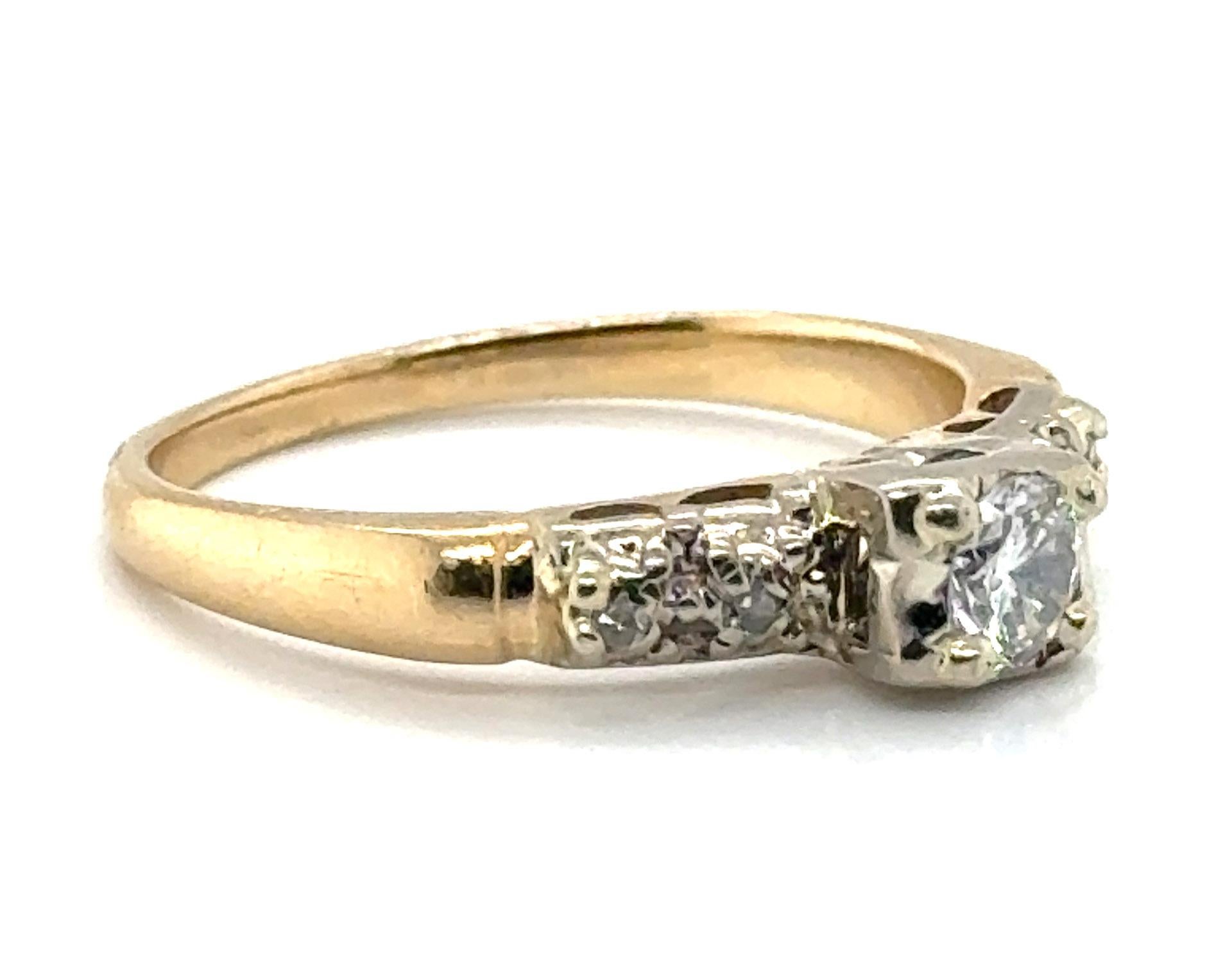 Genuine Original Art Deco Antique from the 1930's-1940's Diamond Engagement Ring .33ct 14K Yellow Gold  


Genuine .25ct Transitional Cut Diamond Center 

100% Natural Mined Diamonds

.33 Carat Diamond Weight

14K Yellow Gold

Circa 1930's-1940's