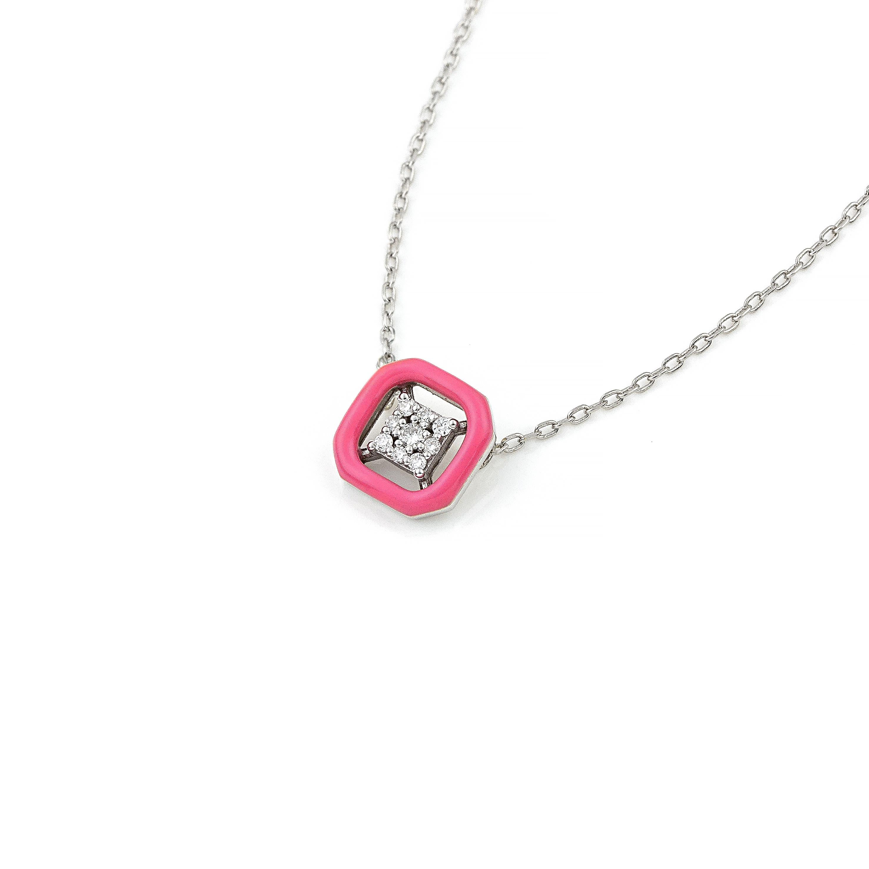 14K gold diamond pendant necklace with a happy pink colour accent, the perfect gift for yourself or a loved one.
100% Recycled 14 K White Gold
Diamonds
Pink Enamel
Size: 1.3 cm/0.51 inches
Inspiration: In the arts, maximalism, a reaction against