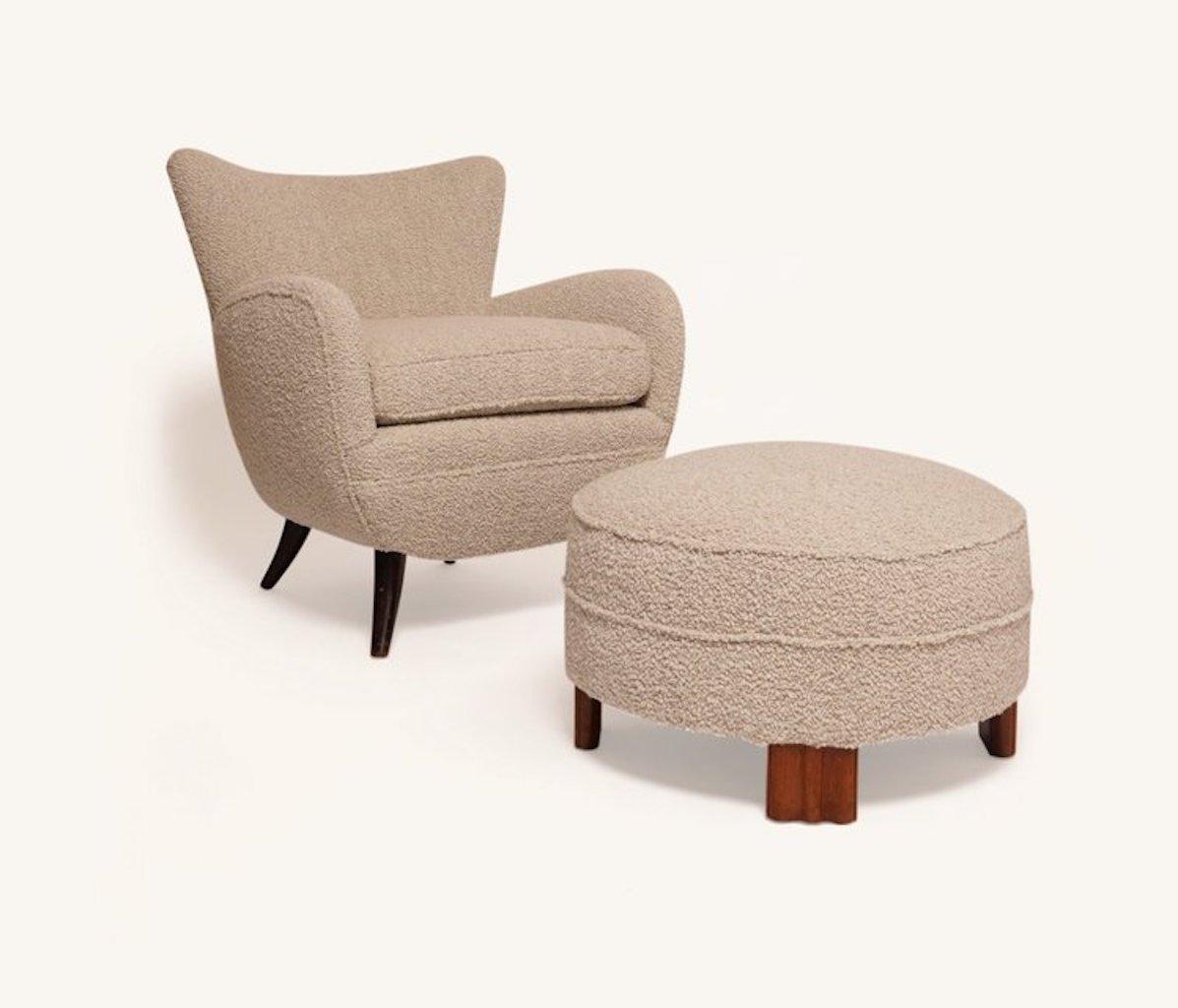 This Deco grey boucle ottomon or foot stool has unique Art Deco styled feet, newly reupholstered by the Somerset House in a warm grey Dedar Milano wool boucle. Beautiful on its own or paired with a chair such as our Ernst Schwadron lounge chair.

 