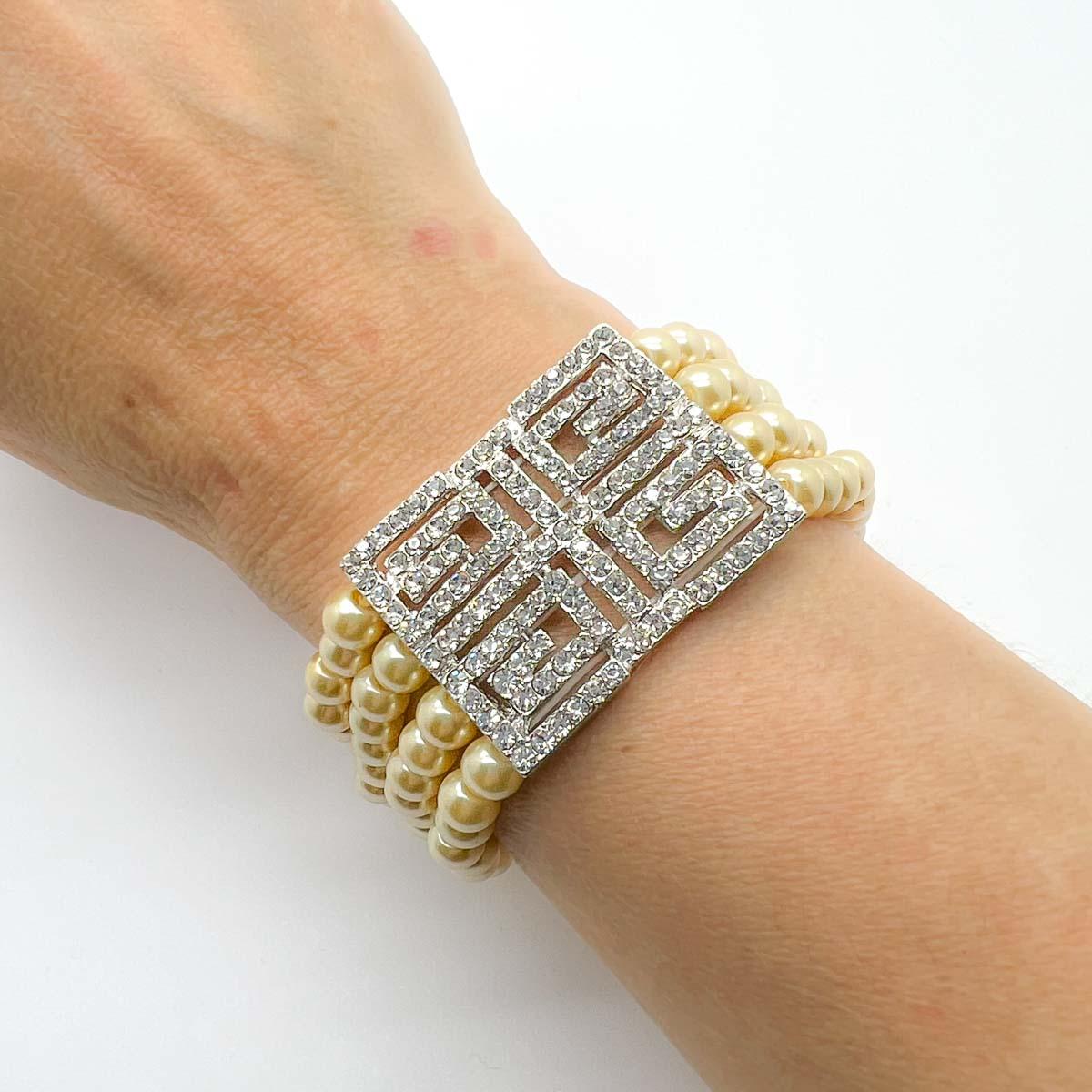 A Deco Inspired Pearl Bracelet. What could be better than rows of pearls around your wrist? Finishing the look with an art deco inspired crystal set panel of course. A timeless and utterly chic classic that will earn a place on your jewel hit list.