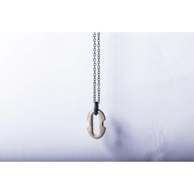 Pendant necklace in brass, it comes on a 74cm sterling silver chain. Brass is silver plated and heavy acid treated.