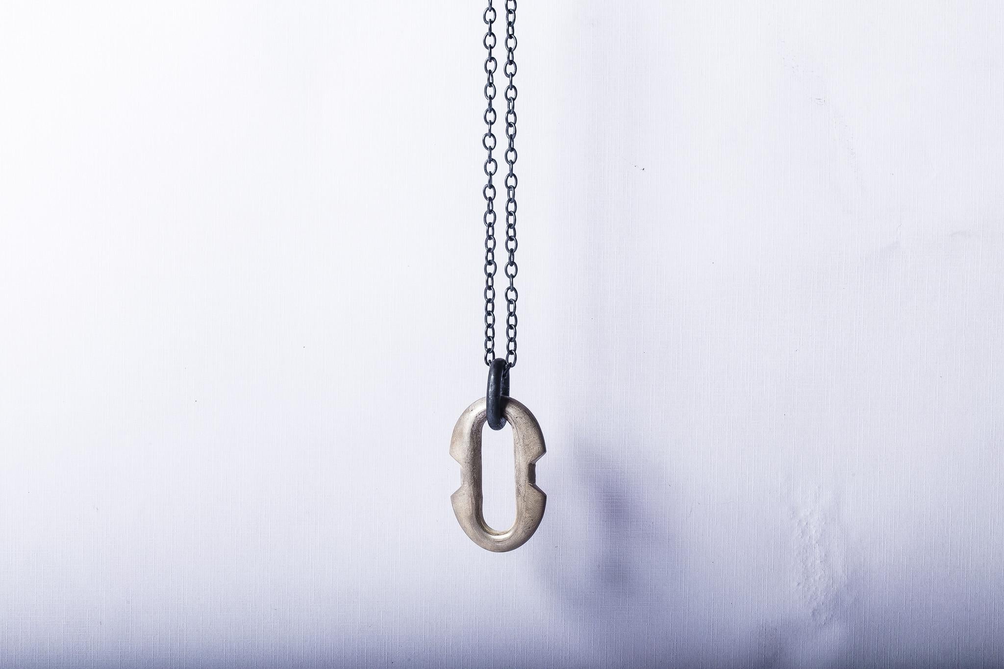 Pendant necklace in brass, it comes on a 74cm sterling silver chain. Brass is silver plated and heavy acid treated.