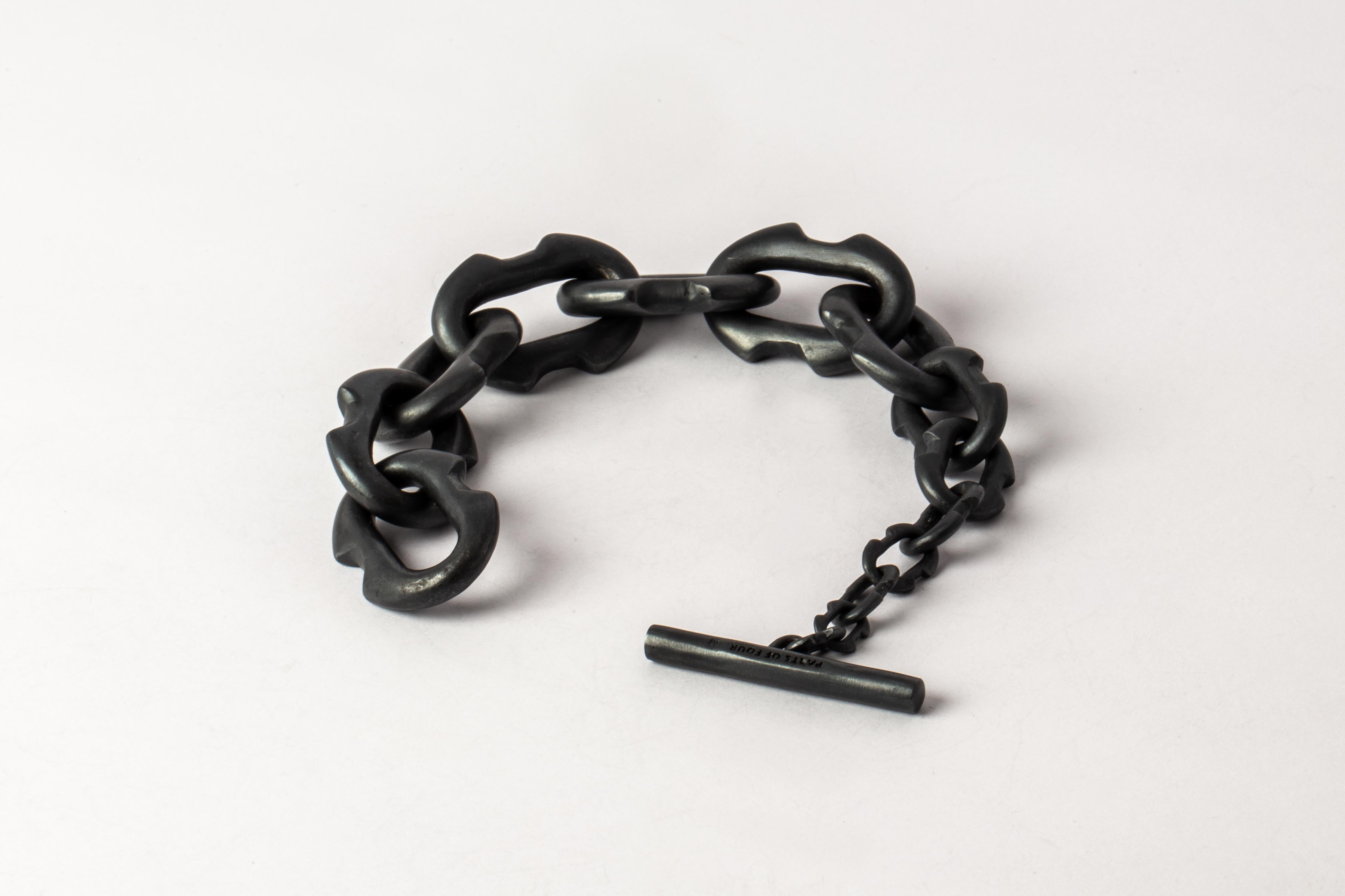 Bracelet in black sterling of oxidized sterling silver. This piece is 100% hand fabricated from metal plate; cut into sections and soldered together to make the hollow three dimensional form. Dimensions Chain link size (L × H): 33 mm × 24 mm
Toggle