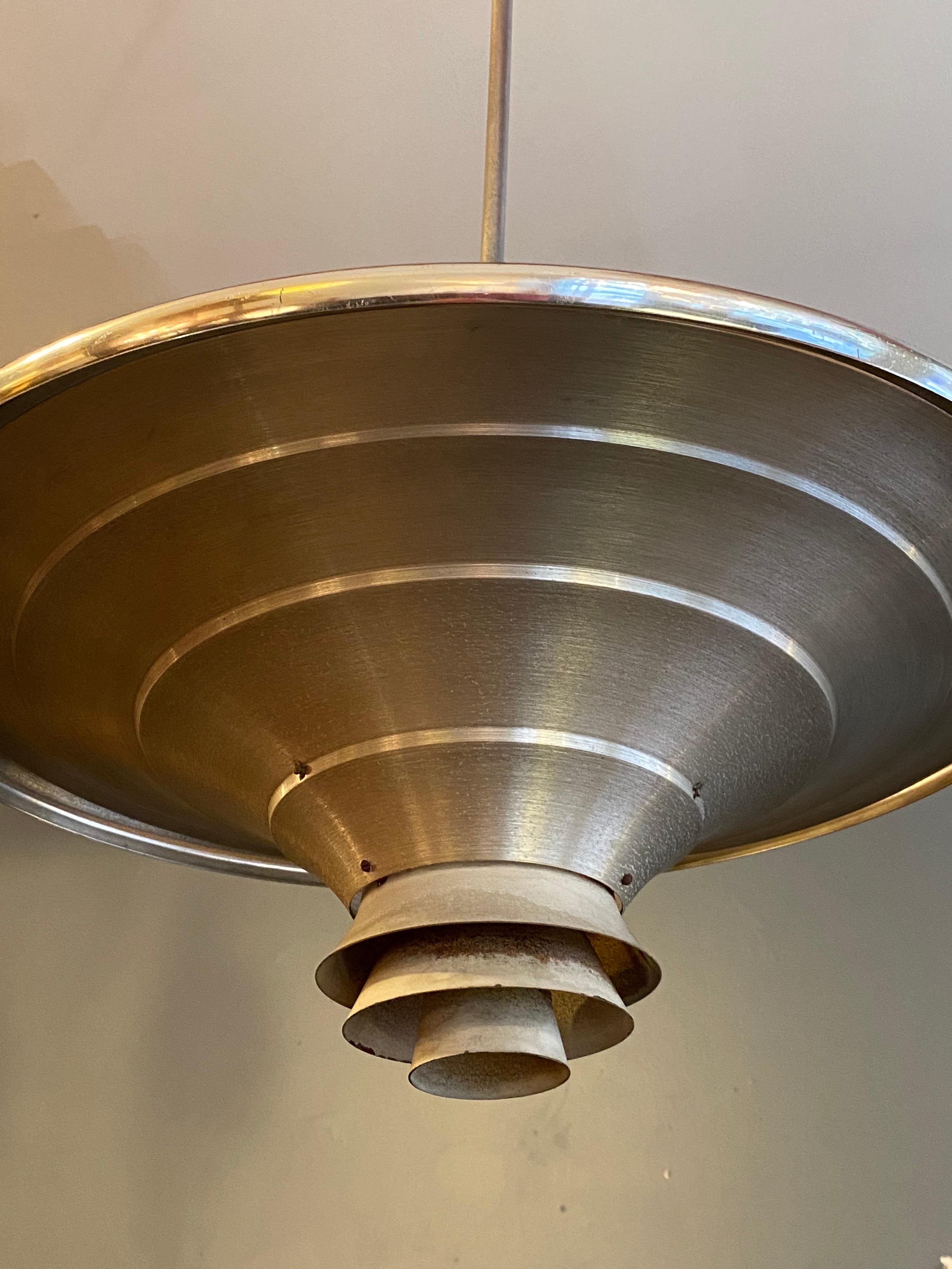 Machine Age hanging light fixture, produced in Chicago. Classic louvered design, aluminum construction.