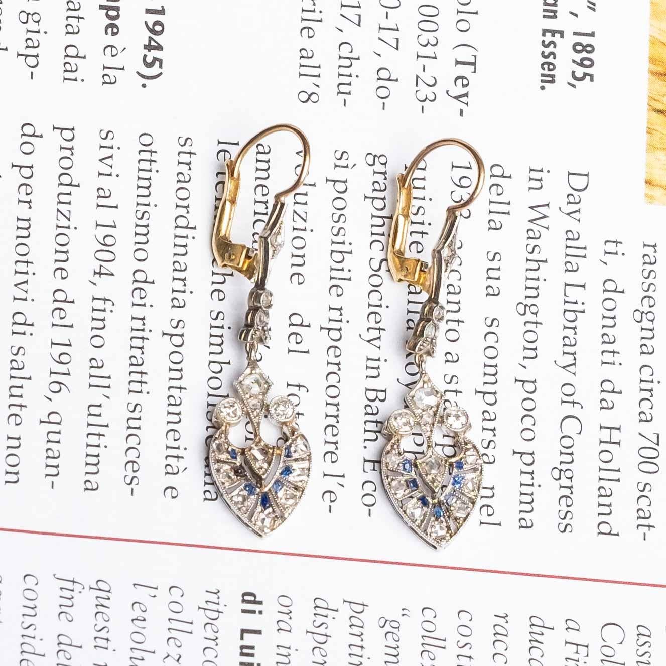 These earrings from the Deco period, 1930s are set in platinum with rose cut and old cut diamonds and calibrated sapphires. The earring is finely hand made with a lever back fastening in gold.

Highlights:
- Deco period 1930s c.a.
- Platinum