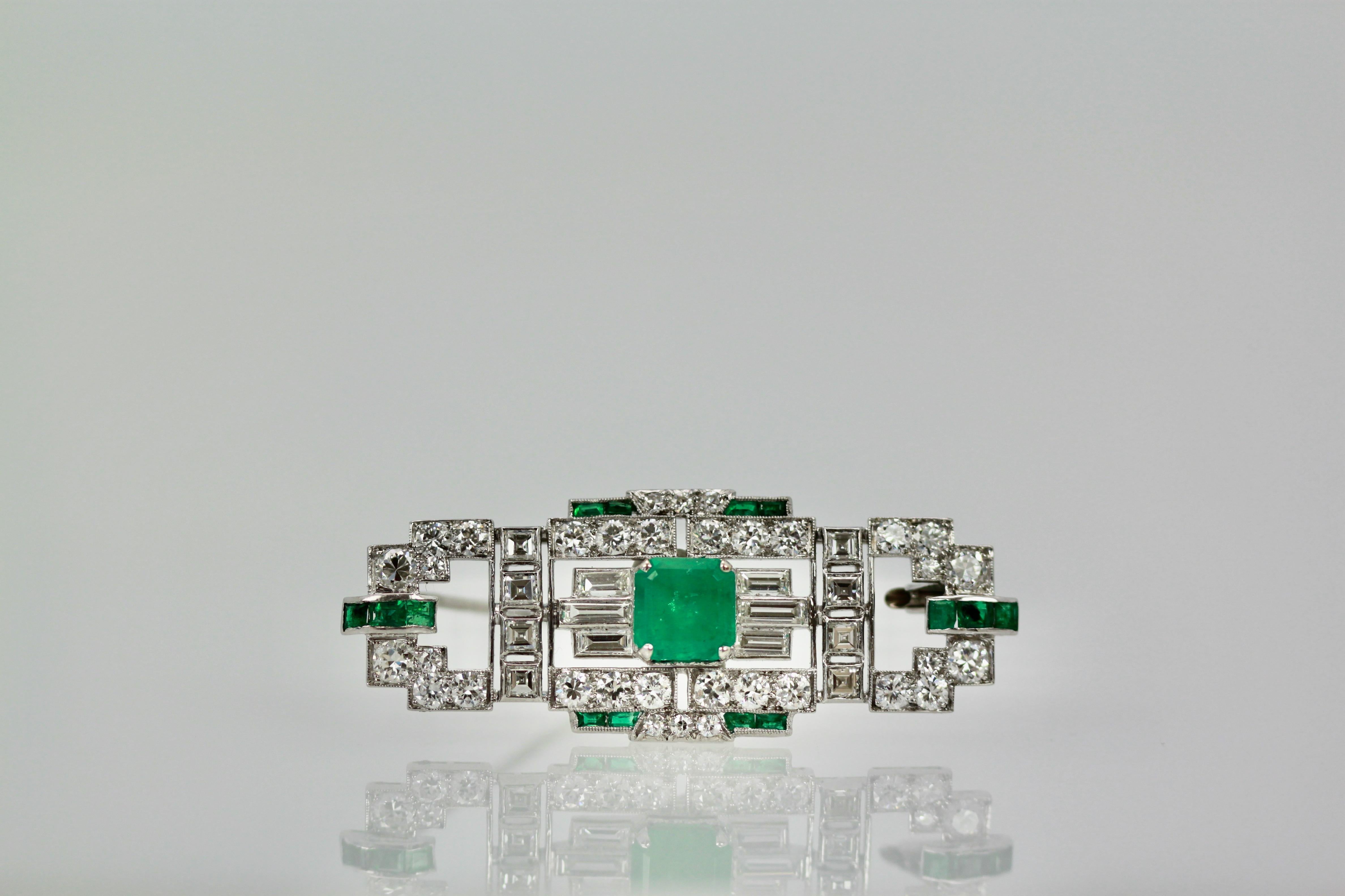 Women's or Men's Deco Platinum Emerald Diamond Brooch For Sale