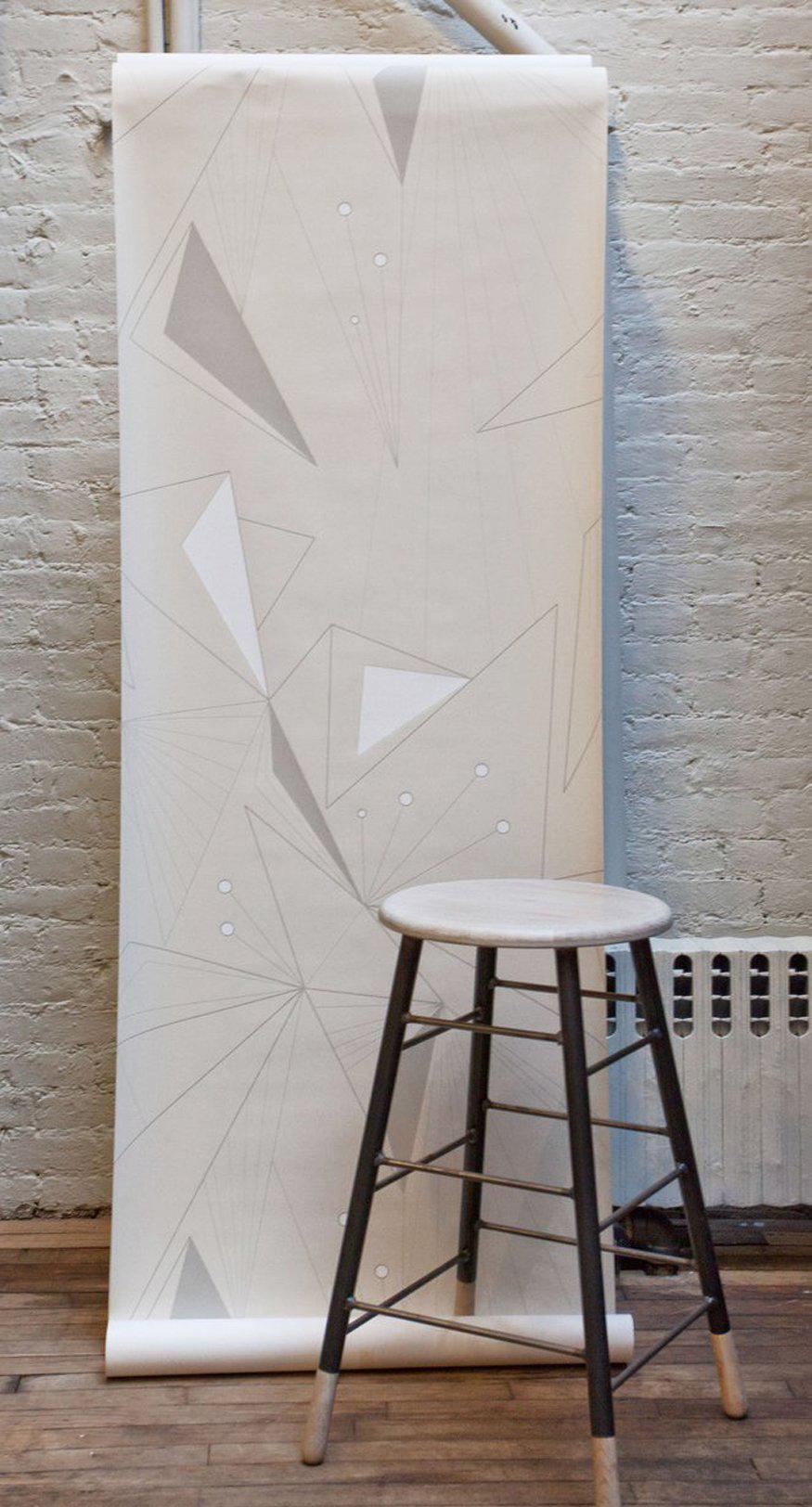 This modern and geometric wallpaper adds graphic warmth and texture to your walls in a soft color white on white palette of snow, stone gray and off-white. It works well with Mid-Century Modern, Hollywood Regency, Art Deco and contemporary