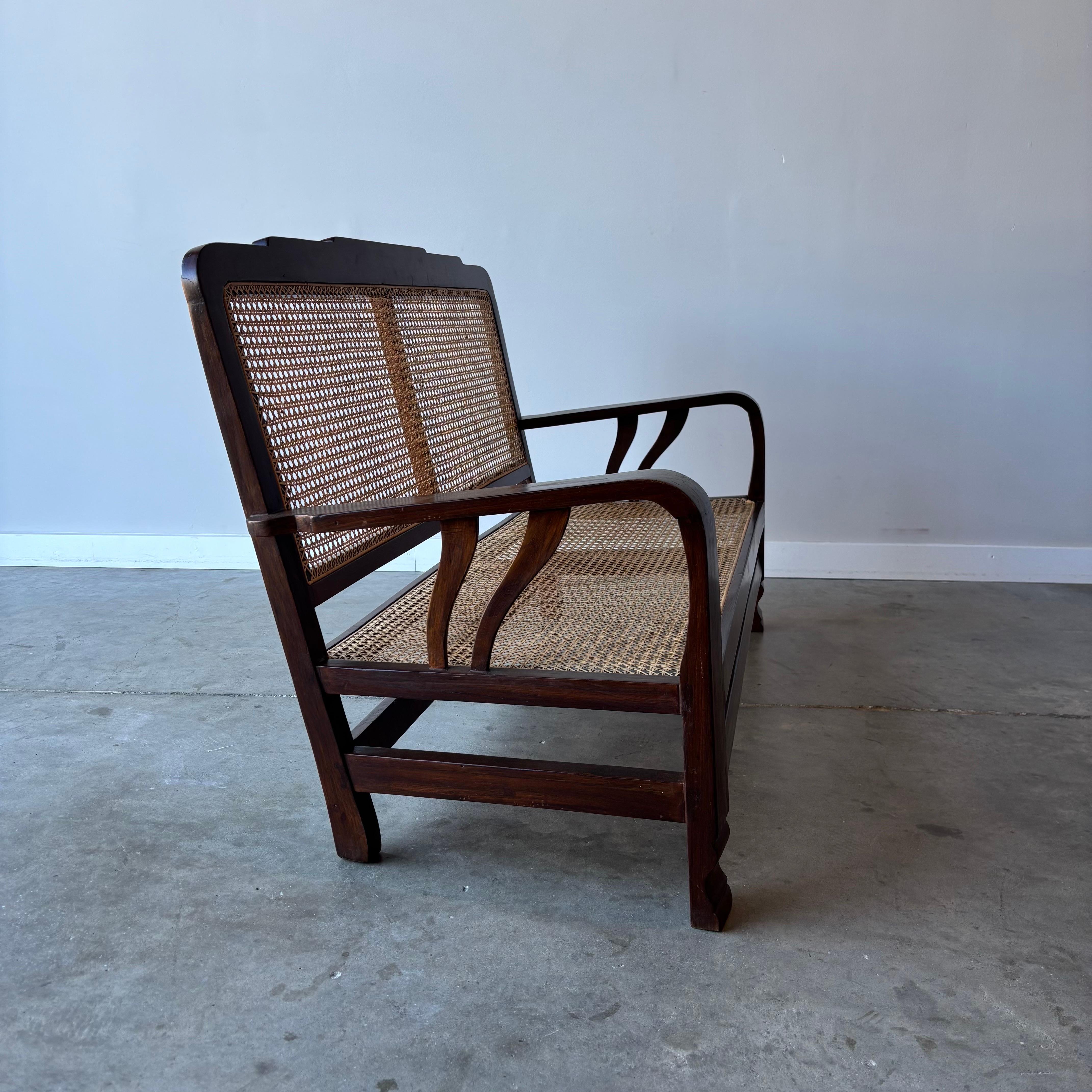 Sillón de ratán Deco siglo XX en venta