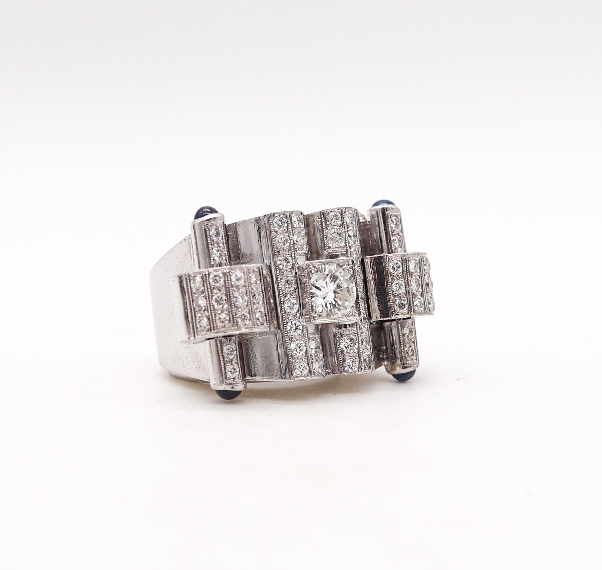 Deco-Retro geometric ring from the machine age period.

Stunning and unusual geometric piece, created during the late art-deco and the retro periods, back in the 1935. This cocktail ring has been crafted with bold volumetric patterns in solid white