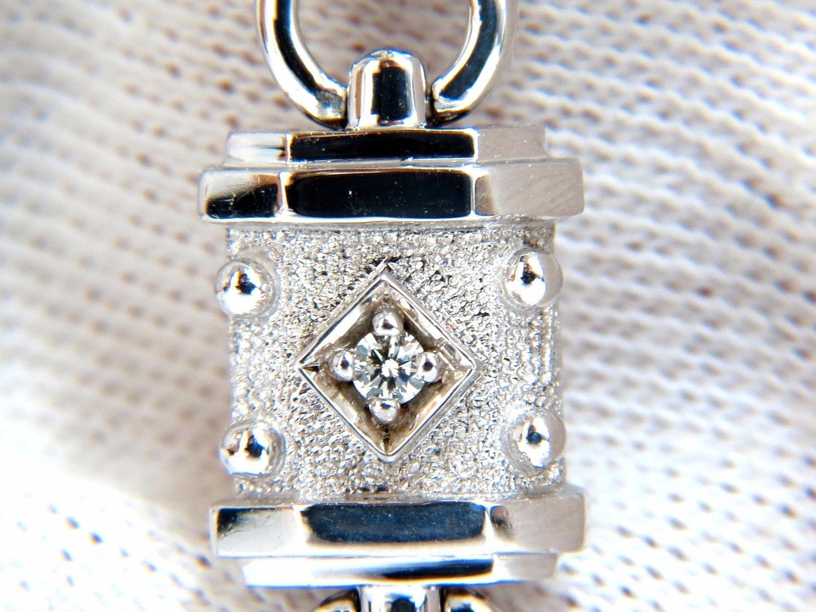 Spanish Gothic Revival Stud Beaded & Hinged
Box Bead Micro-set.
.33ct. natural diamonds.
Rounds, Full cut brilliants
G colors Vs-2 clarity.
14kt. white gold
32 Grams.
7.25 Inches long (wearable length)
10mm wide
pressure clasp and safety catch