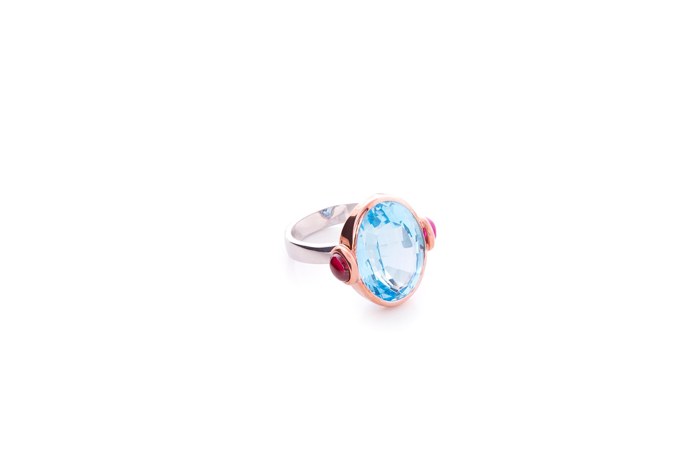 Rossella Ugolini Design Collection Deco Style 18 Karat Gold Topaz Rubelite Cabochon Blue Candy Cocktail Ring
The character of the Blue Topaz Candy ring is almost tangible, thanks certainly to the size of the yellow Citrine gemstone it encompasses, a