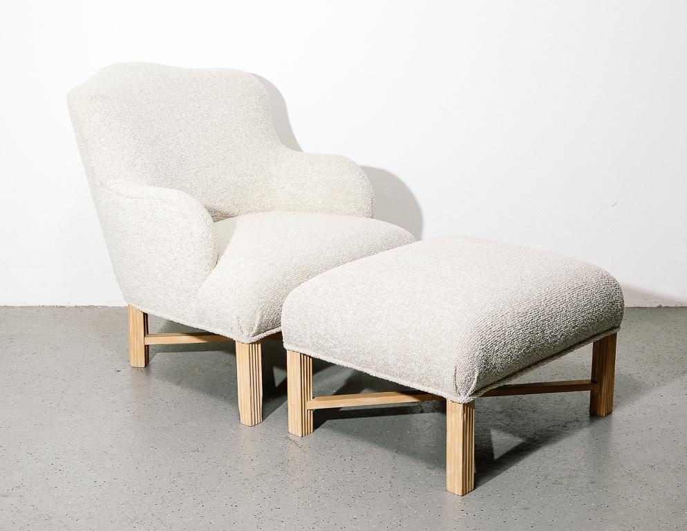 Deco style armchair and ottoman designed by Sally Serkin for Robert J. Scott. Freshly upholstered in vintage ivory bouclé fabric.
