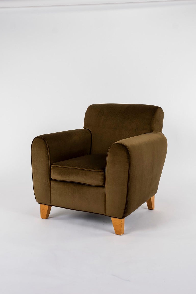Deco style club chair newly upholstered in an olive velvet.