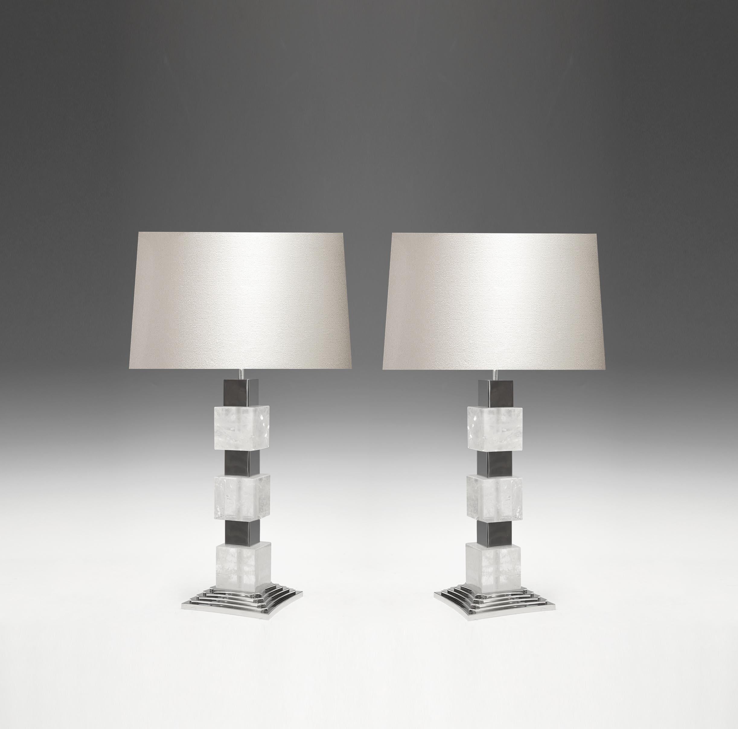 A pair of deco style rock crystal quartz lamps with nickel plating inserts and bases. Created by Phoenix Gallery, NYC.
To the top of the rock crystal: 15 in/H.
(Lampshade not included).
Each lamp installs two sockets.