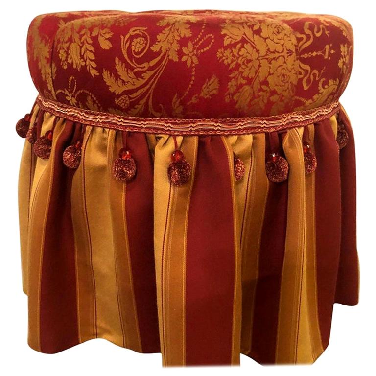 Hollywood Regency Upholstered Tufted Red and Gilt Decorated Ottoman or Footstool For Sale