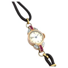 Orologio d'epoca in oro 18 ct. con 8 diamanti taglio antico e 6 rubini