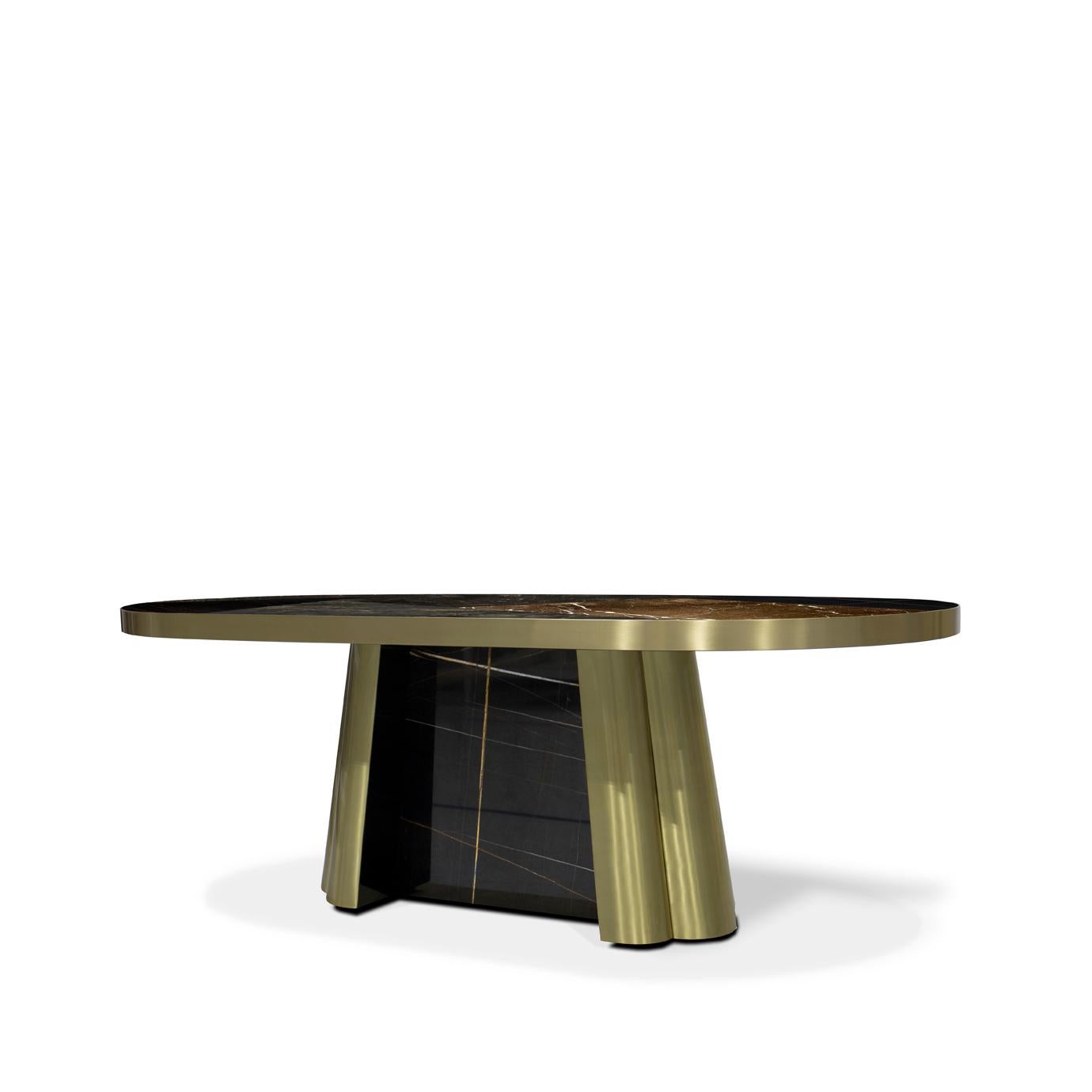 Coupled with a stunning satin brass base, the striking, geometric patchwork marble top conveys a sense of bold elegance to any dining area. Dine lavishly in the presence of Decodiva.