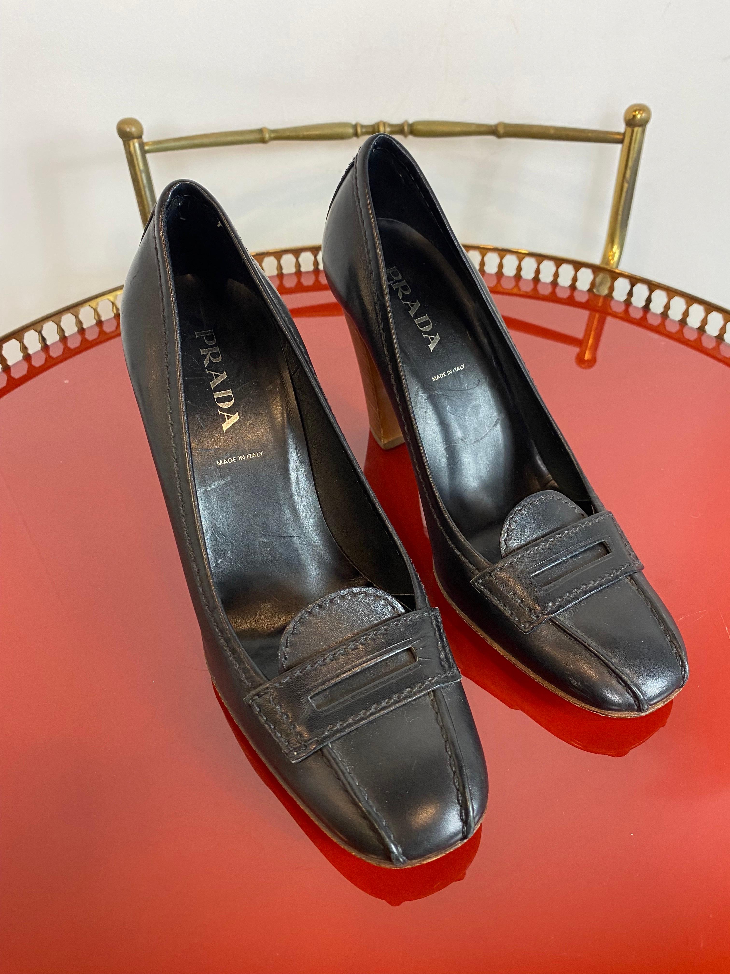 Leather shoes by Prada. 
Black with brown heel and sole. 
In perfect condition. 

N 36,5 
Heel height 9.5 cm