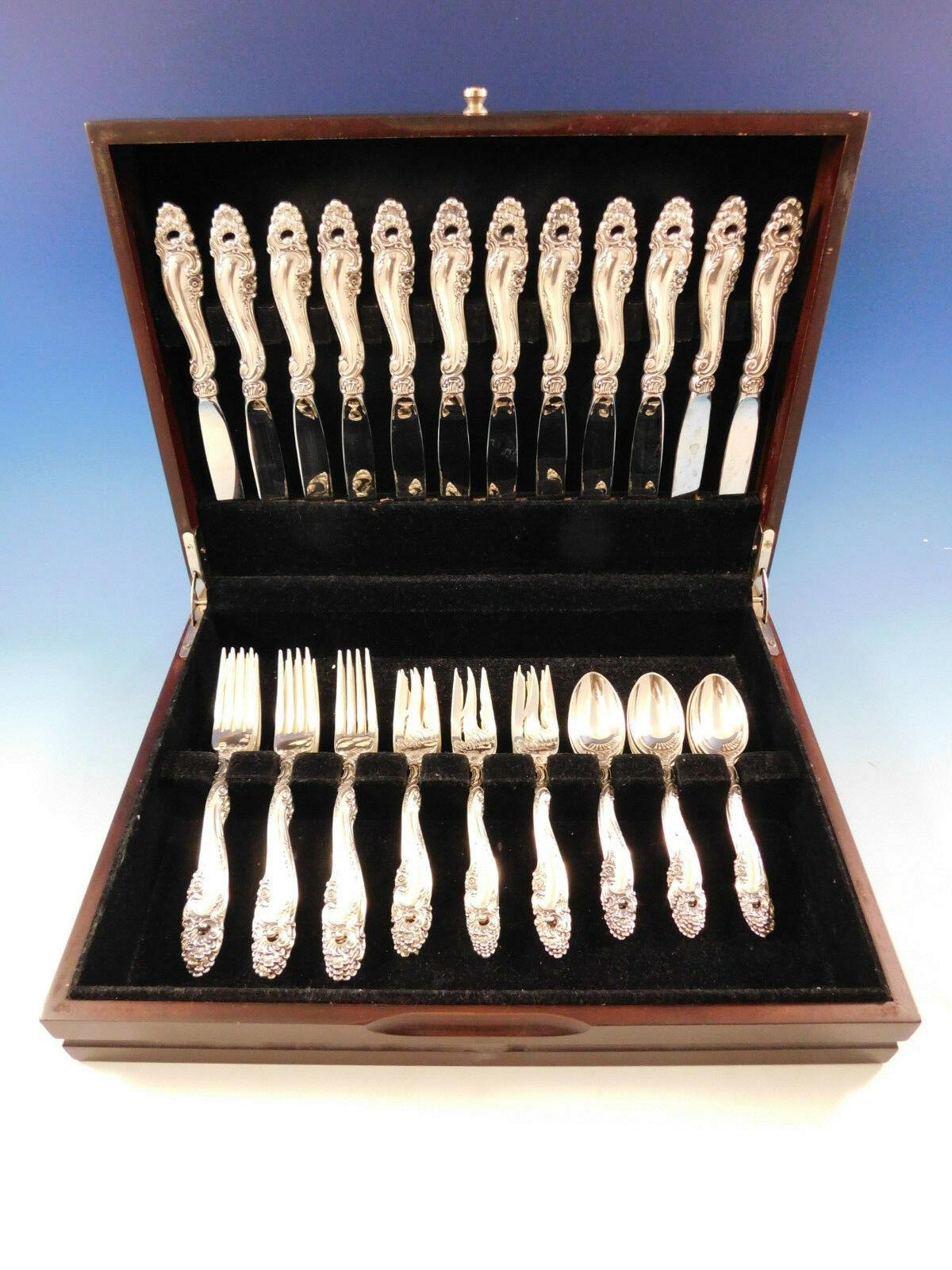 Decor by Gorham sterling silver flatware set of 48 pieces. This set includes:

12 knives, 9