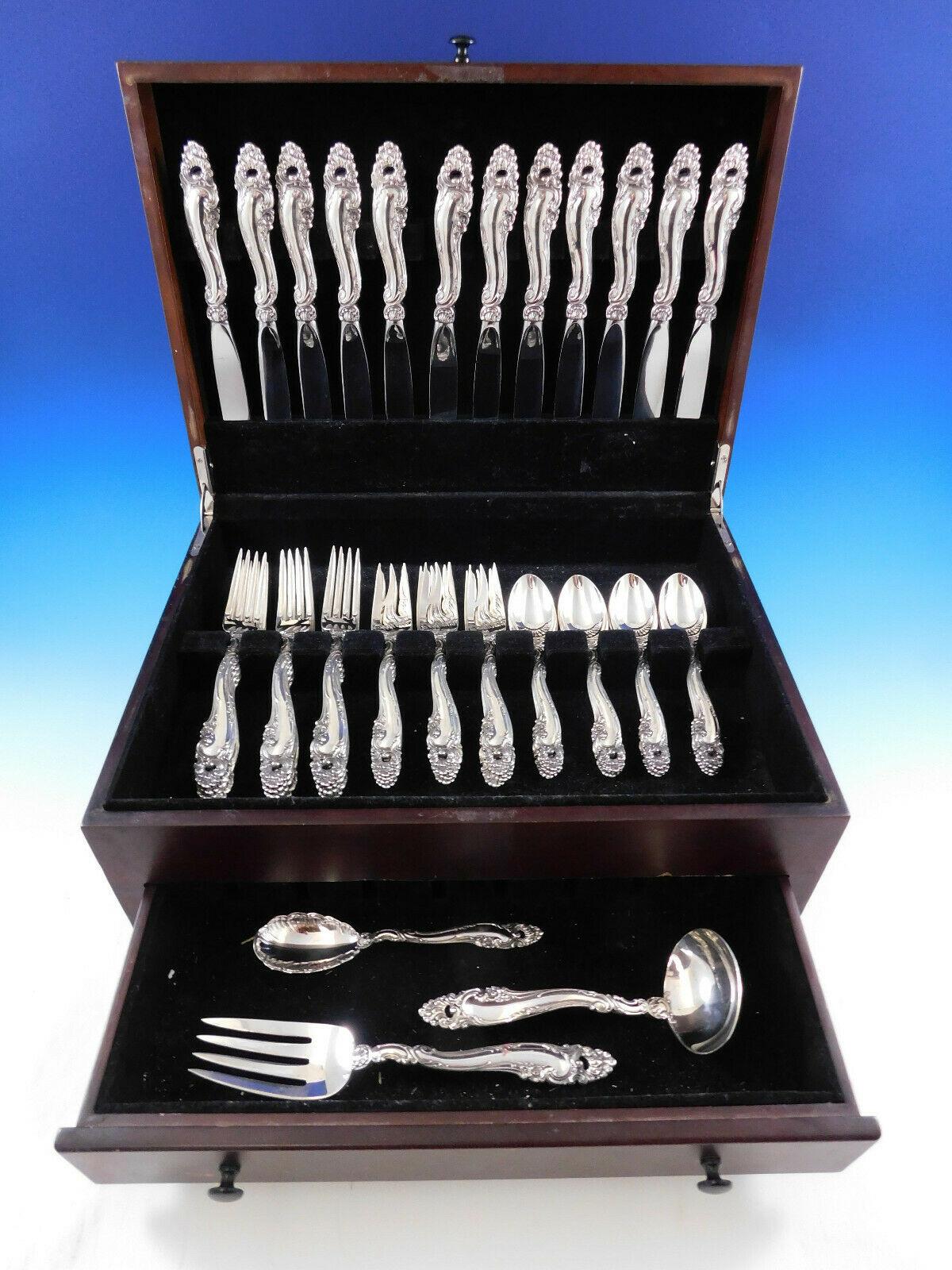 Large and heavy Dinner Size Decor by Gorham sterling silver flatware set - 51 pieces. This set includes:

12 Dinner Size Knives, 9 5/8
