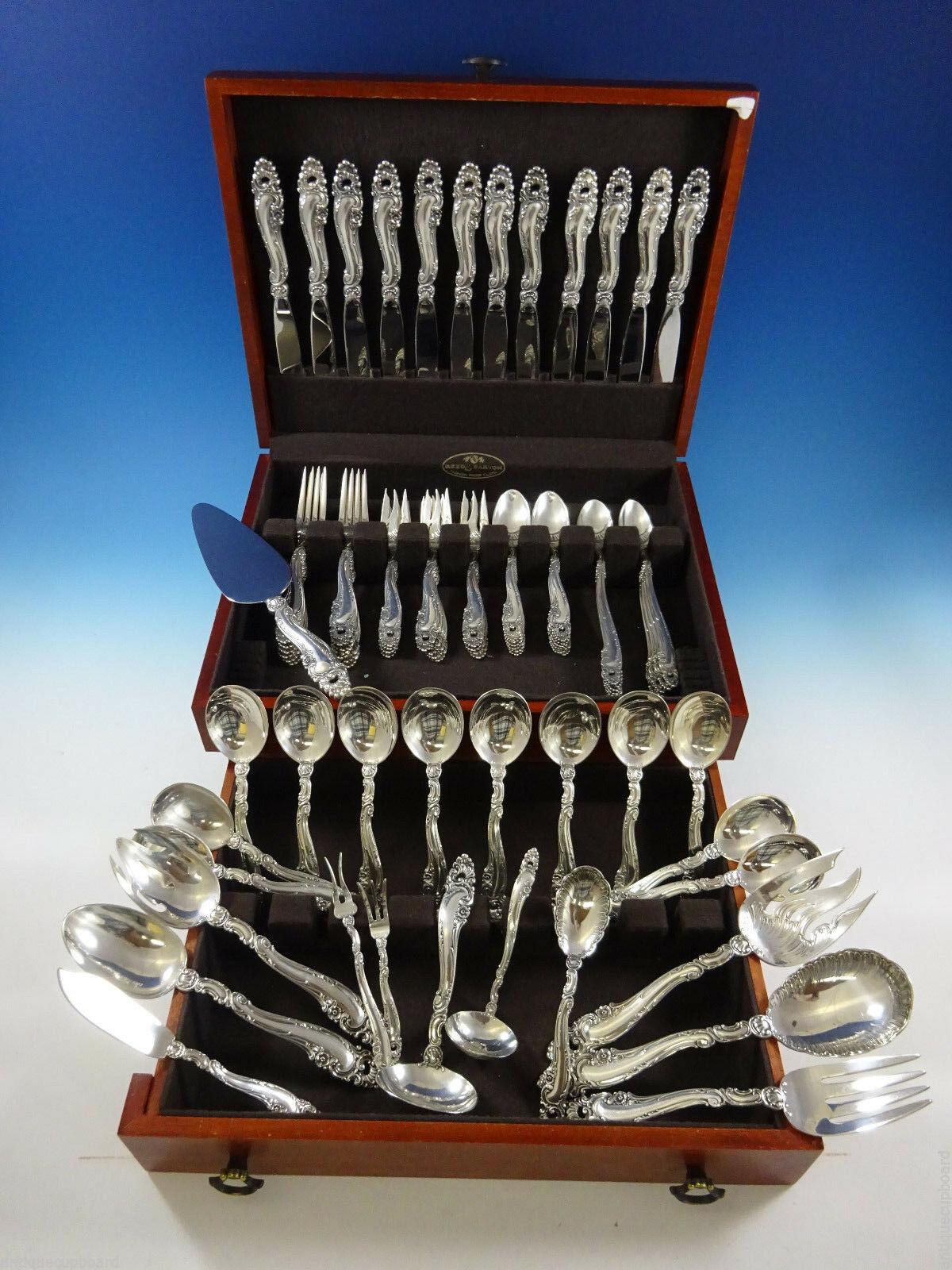 Decor by Gorham sterling silver flatware set - 84 Pieces. This pattern is heavy and features Rococo swirls, shells, and small flowers. This set includes:

12 knives, 9