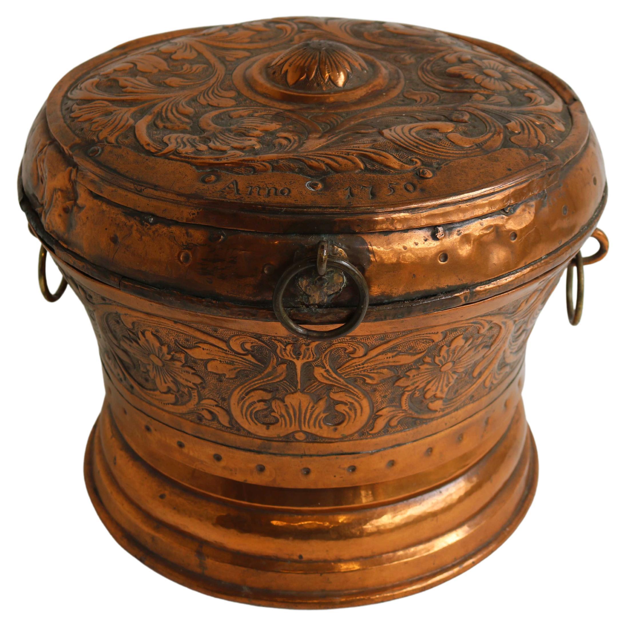 Antique copper bowl with lid, 18th century
Beautiful and richly decorated antique copper pot with lid with a very attractive decorated decor of seed beads in Rococo style. There are two original handles on either side. This box is dated Anno 1750