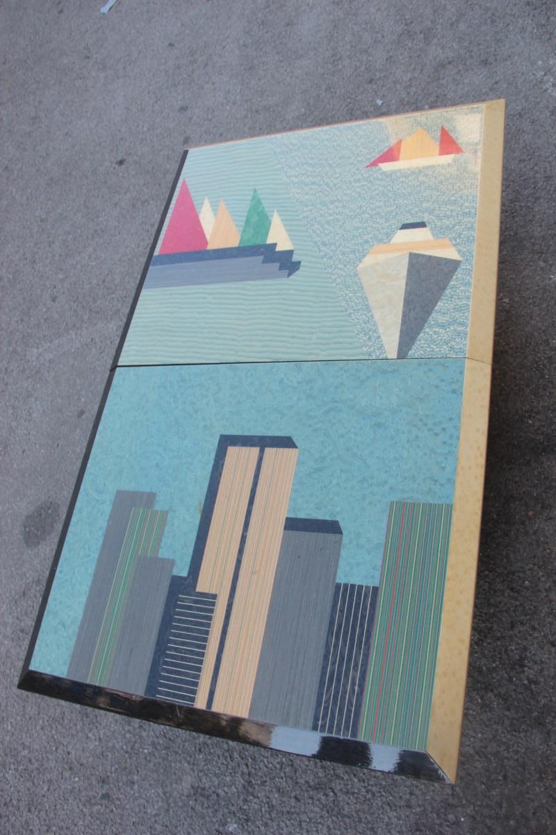 Decorated laminate low table skyline New York Italian design 1980 skyscraper decorated laminate low table skyline New York Italian design 1980 skyscraper.
Made with colored laminate decorations that represent the city of New York and the naval