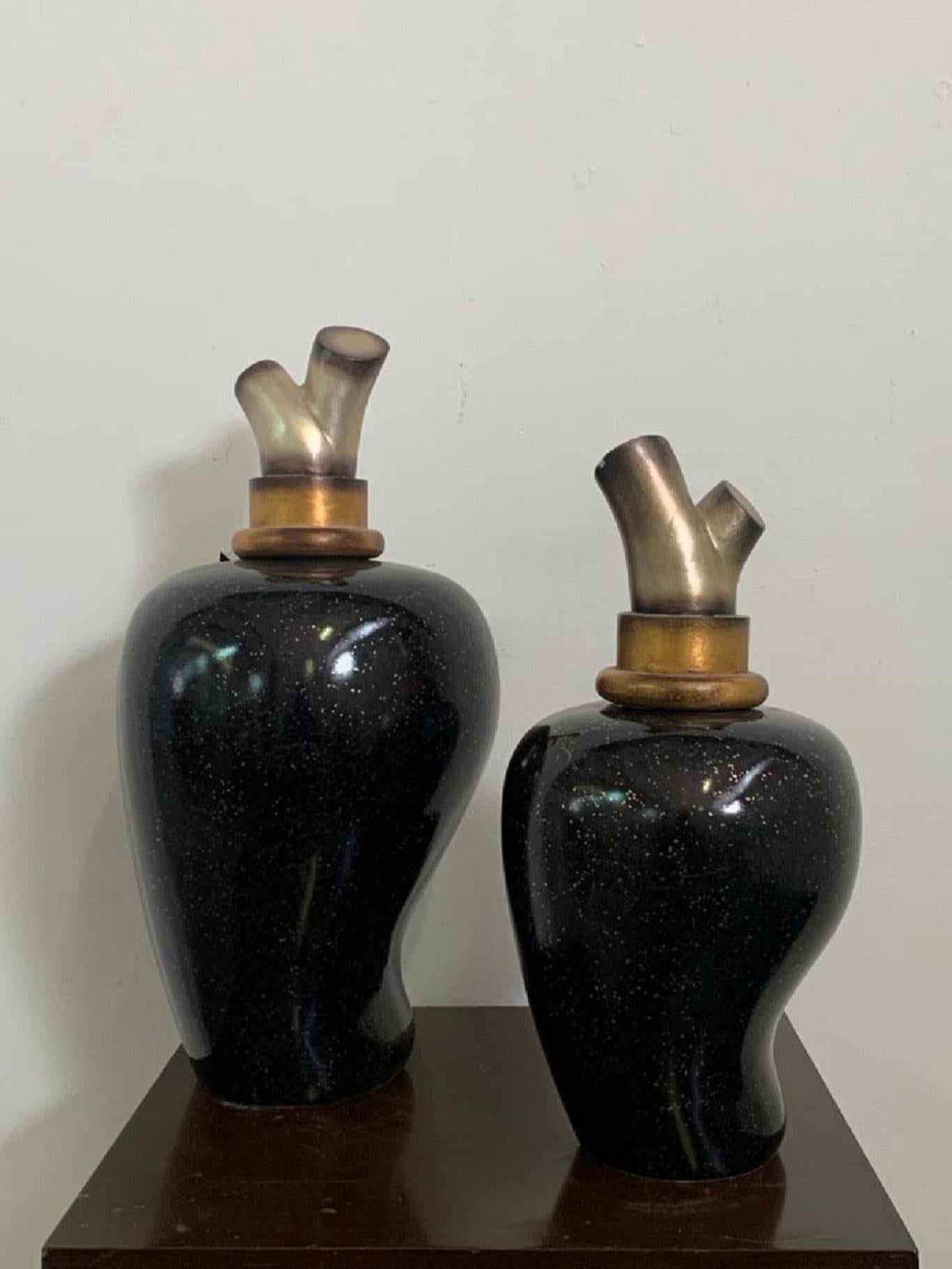 Vases with silver and gold lid internally decorated in black dotted gold. Large: h 57 x diameter 26 cm. Small: h 47 x diameter 22 cm. 
Packaging with bubble wrap and cardboard boxes is included. If the wooden packaging is needed (fumigated crates or
