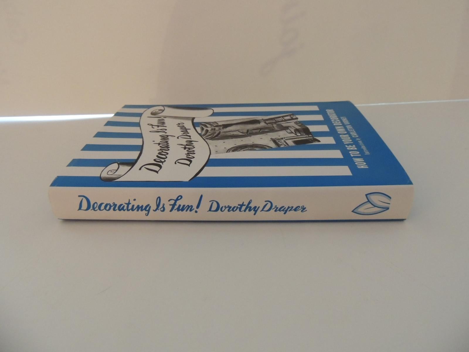 Decorating is Fun! by Dorothy Draper vintage decorating hardcover book.
How to be your own decorator
Preface by Mrs. Theodore Roosevelt
New York, 2006
Publisher: Pointed Leaf Press
Language: English
Hardcover: 278 pages
Dimensions: 6.25 x