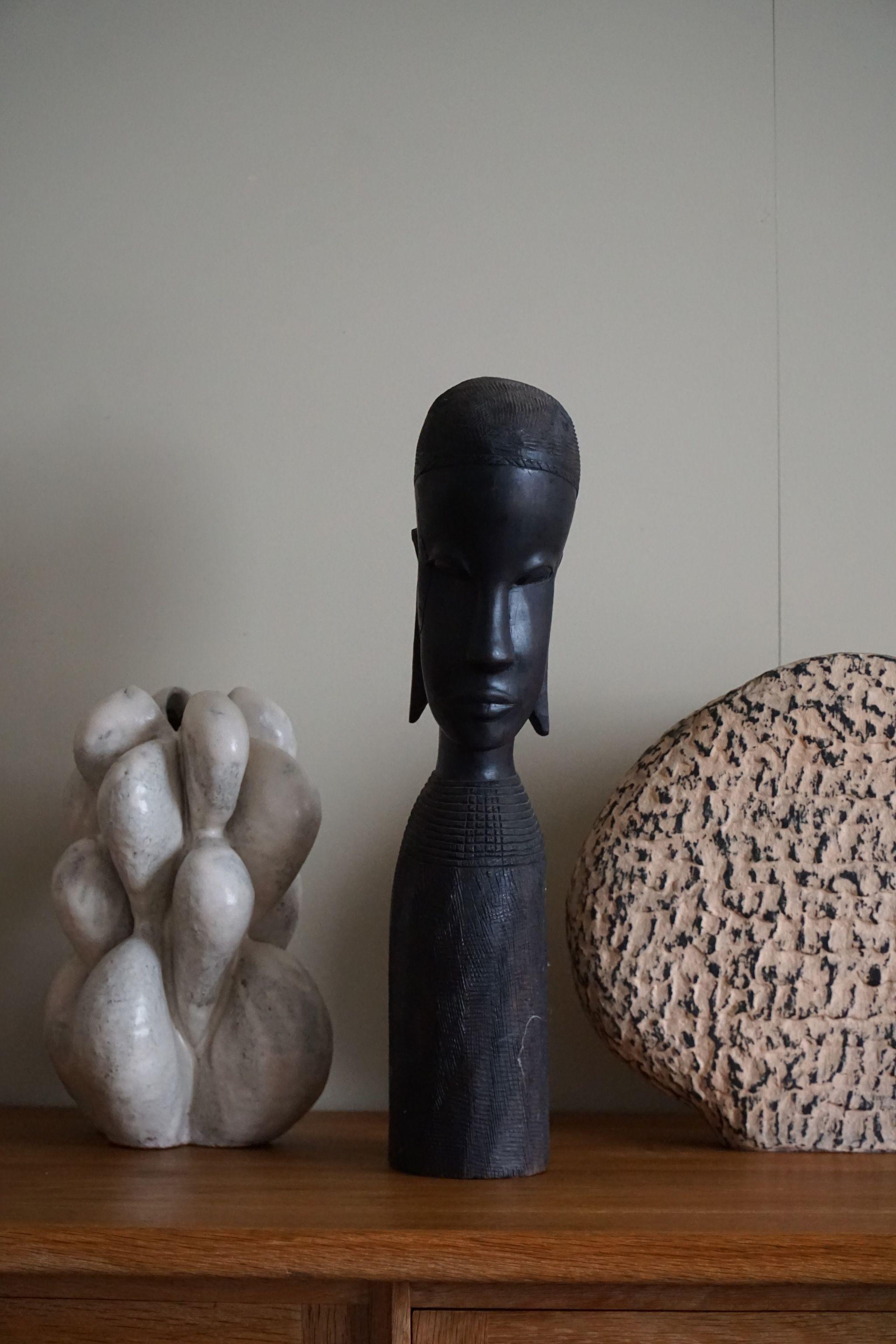Primitive Decorative African Wooden Sculpture,  Mid Century, Handcrafted in the 1940-50s For Sale