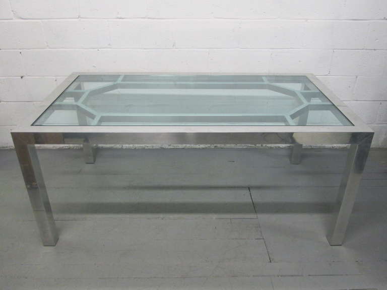 Decorative aluminum table or desk with glass top.
 