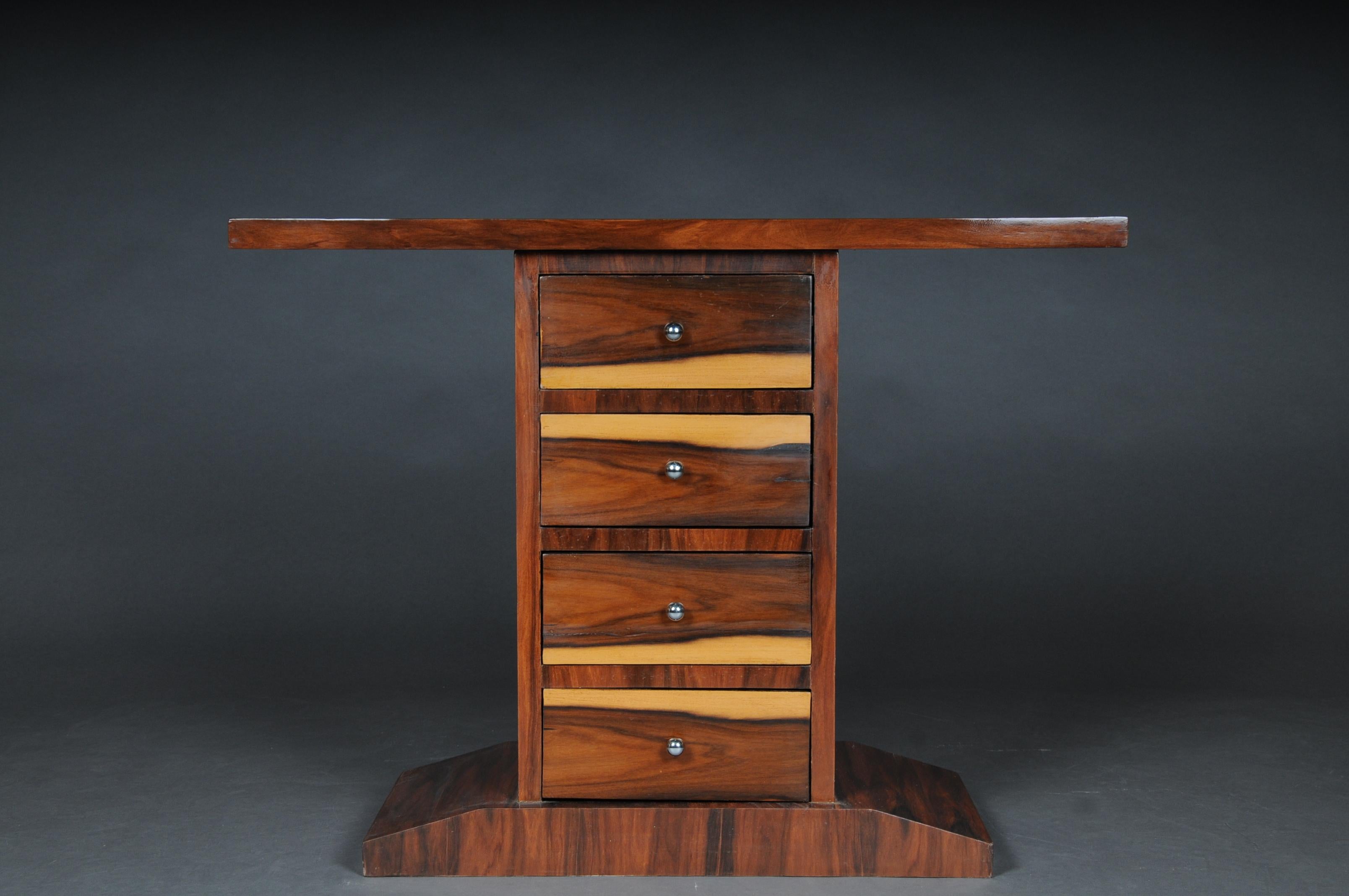 Solid softwood. Art Deco chest of drawers with 4 drawers. The entire body was veneered with tulip wood and maple root veneer. Shellac hand polished.

   
