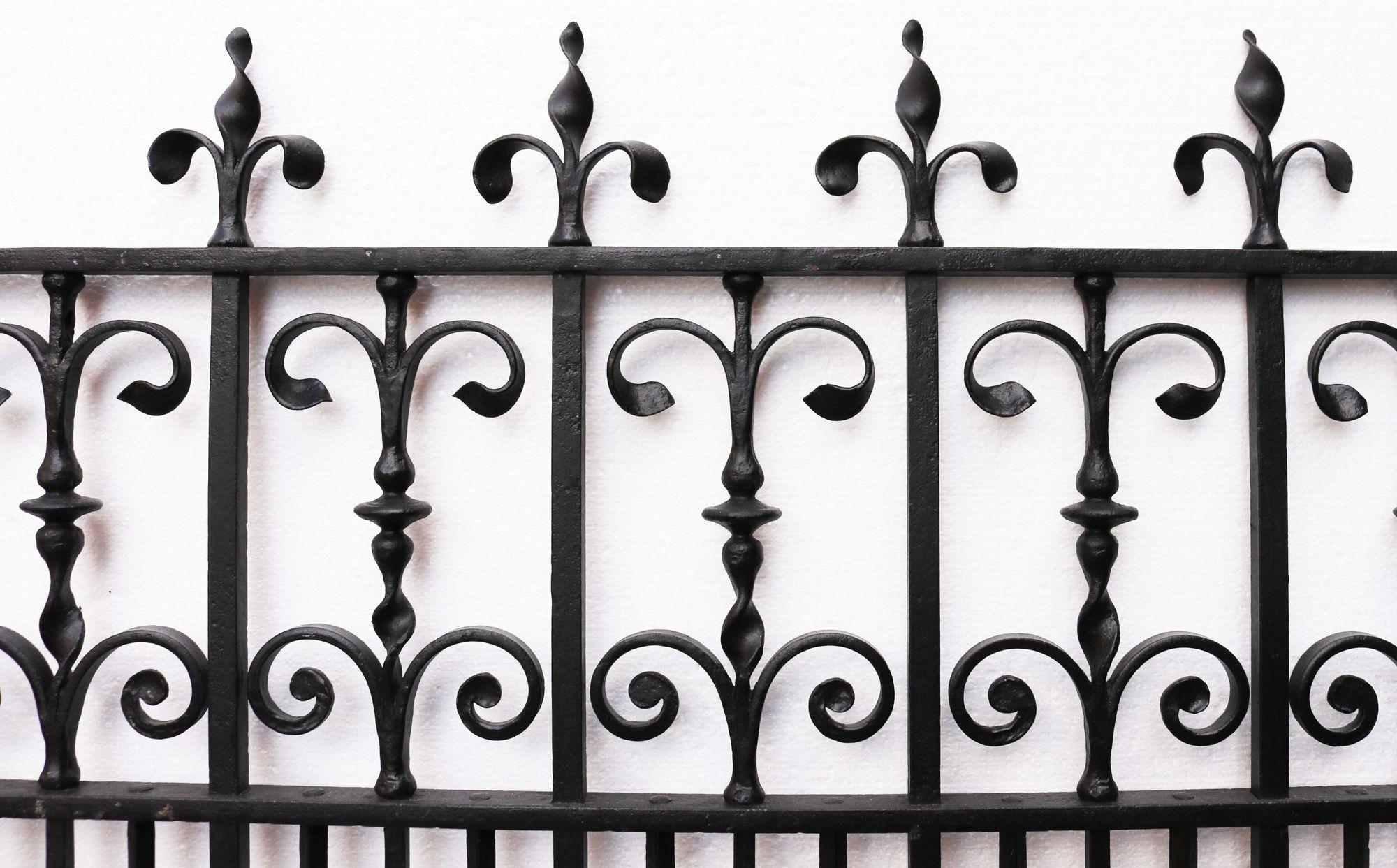 Decorative antique iron gate. A large English, blacksmith made side gate, finely detailed with scrollwork and foliage.
 
Additional Dimensions
For an opening of approx. 104 cm.