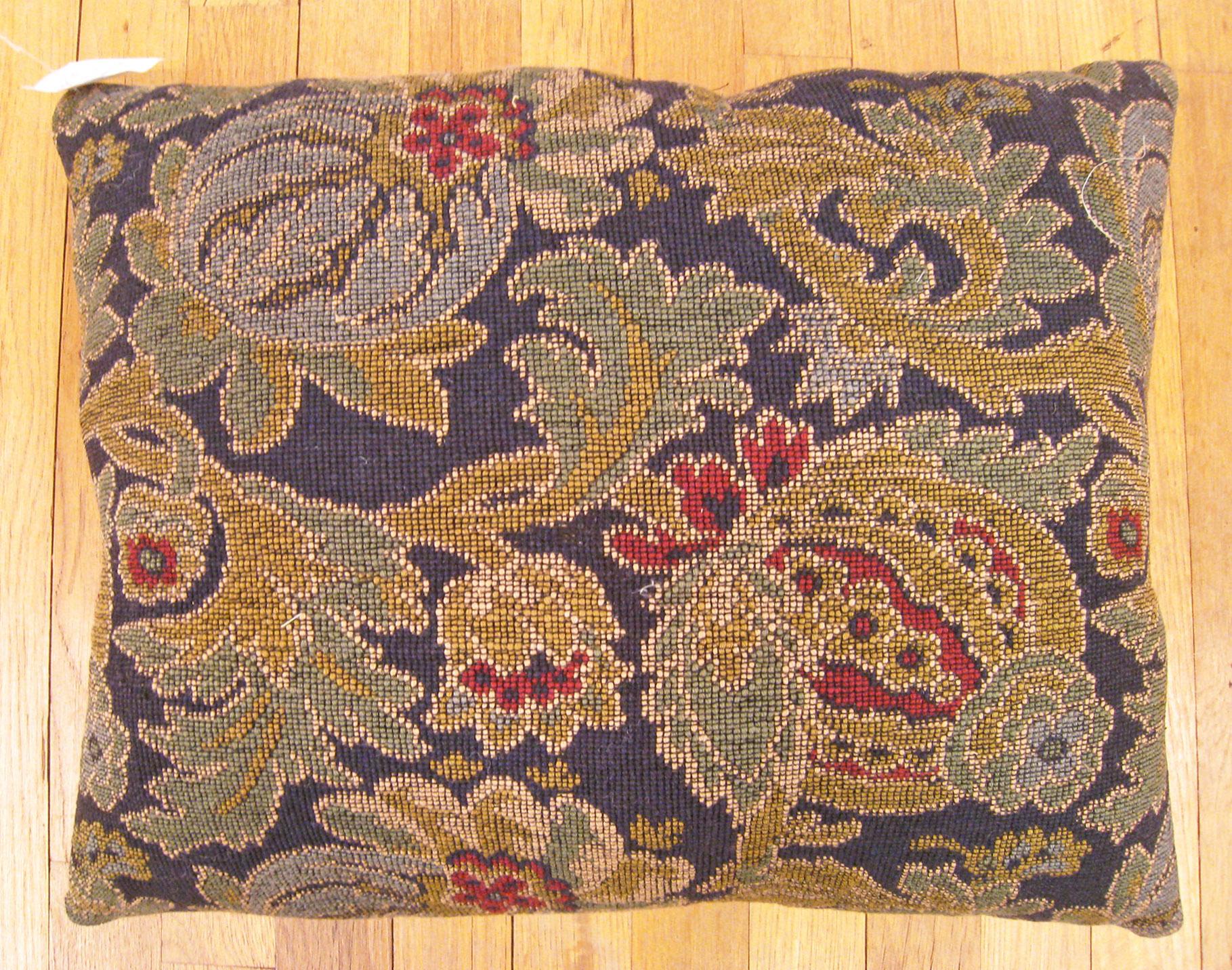 Antique Jacquard Tapestry Pillow; size 1'5” x 1'8”.

An antique decorative pillow with floral elements allover a gray green central field, size 1'5