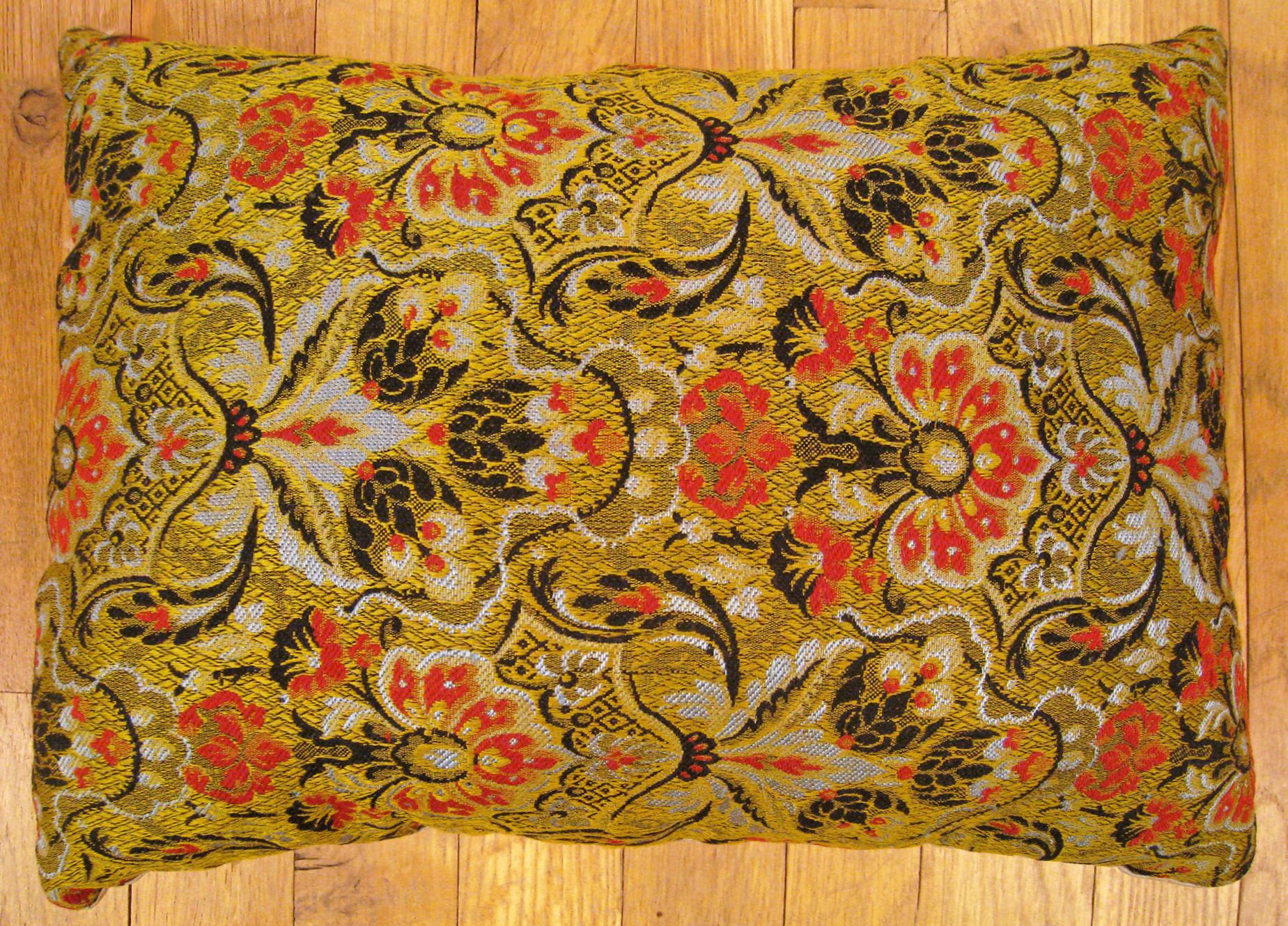 Antique Jacquard Tapestry Pillow; size 1'0” x 1'4”. 

An antique decorative pillow with floral elements allover a gold green central field, size 1'0