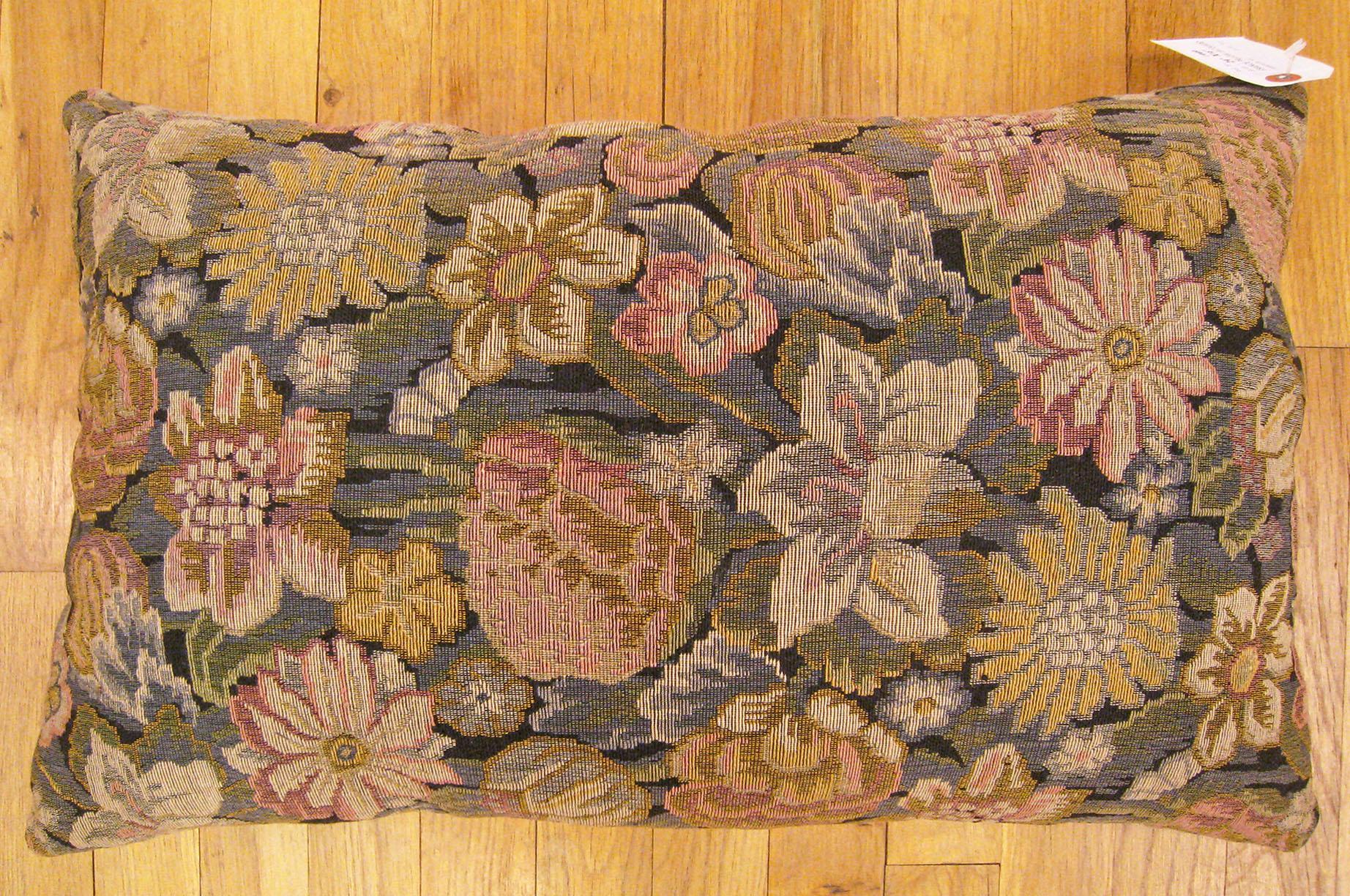 Antique Jacquard Tapestry Pillow; size 24” x 16” (2’ 0” x 1’ 4”)

An antique decorative pillow with floral elments allover a green central field, size 24” x 16” (2’ 0” x 1’ 4”). This lovely decorative pillow features an antique fabric on front which