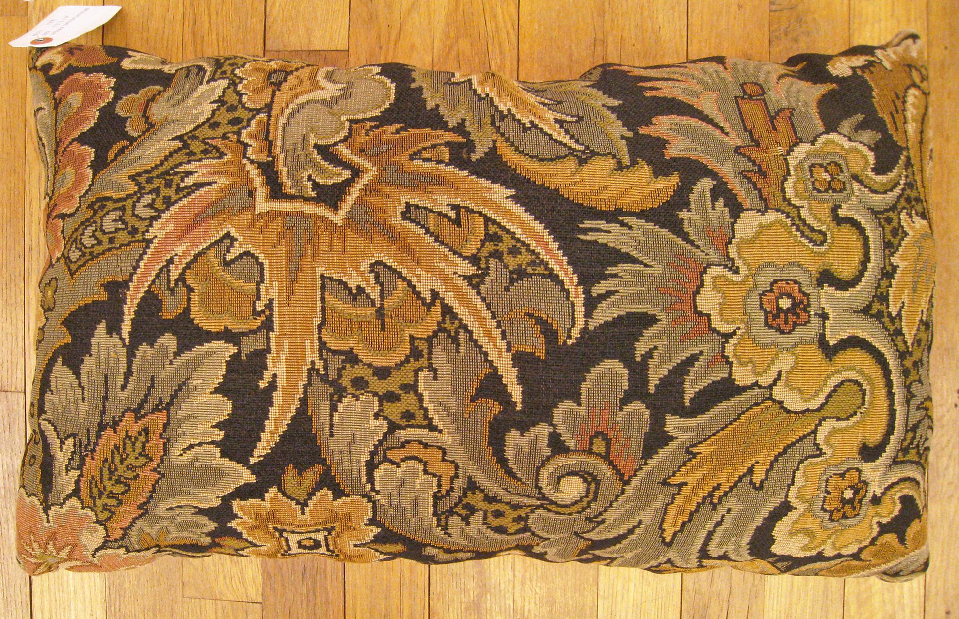 Antique Jacquard Tapestry pillow ; size 1'2” x 2'0”.

An antique decorative pillows with floral elements allover a gold green central field, size 1'2