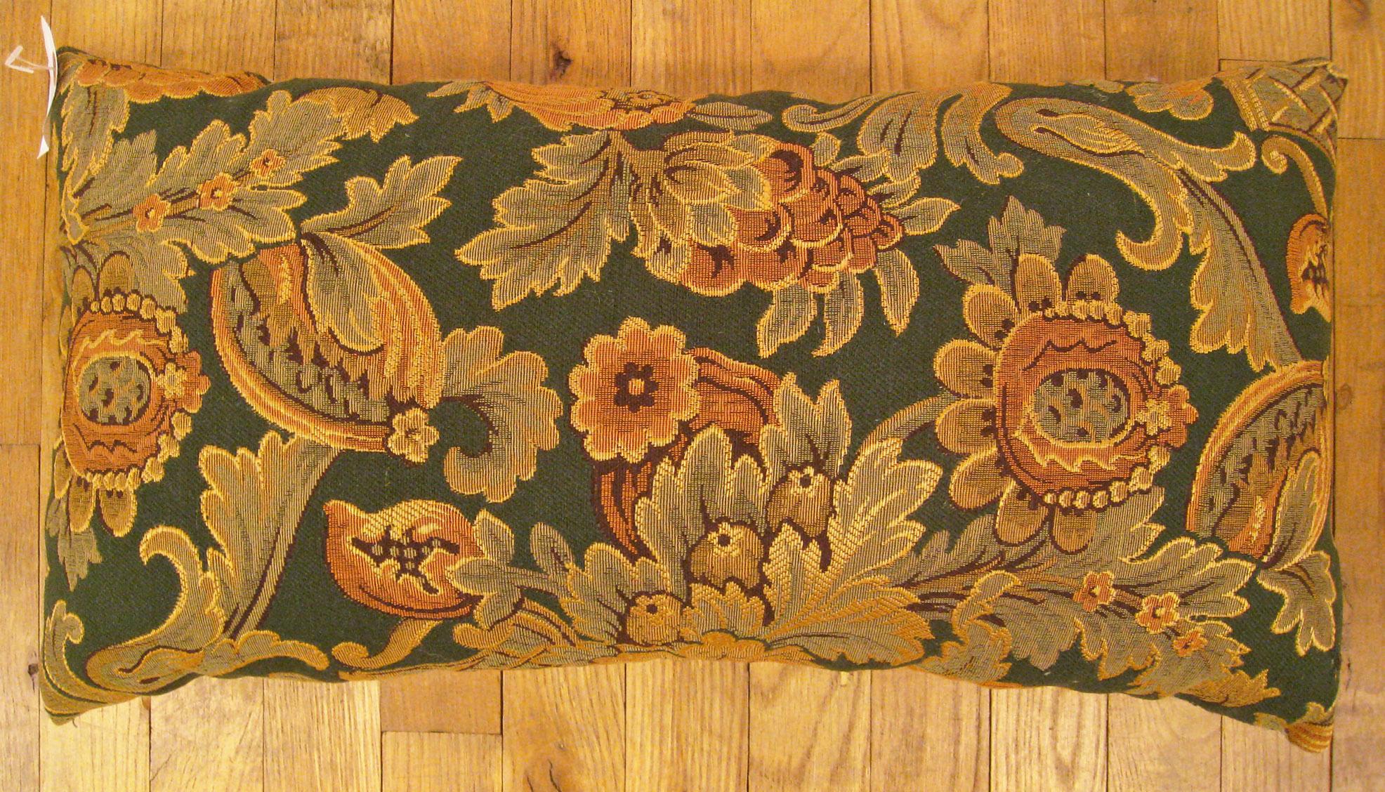Antique Jacquard Tapestry Pillow; size 1'0” x 1'11”.

An antique decorative pillow with floral elements allover a gold green central field, size 1'0