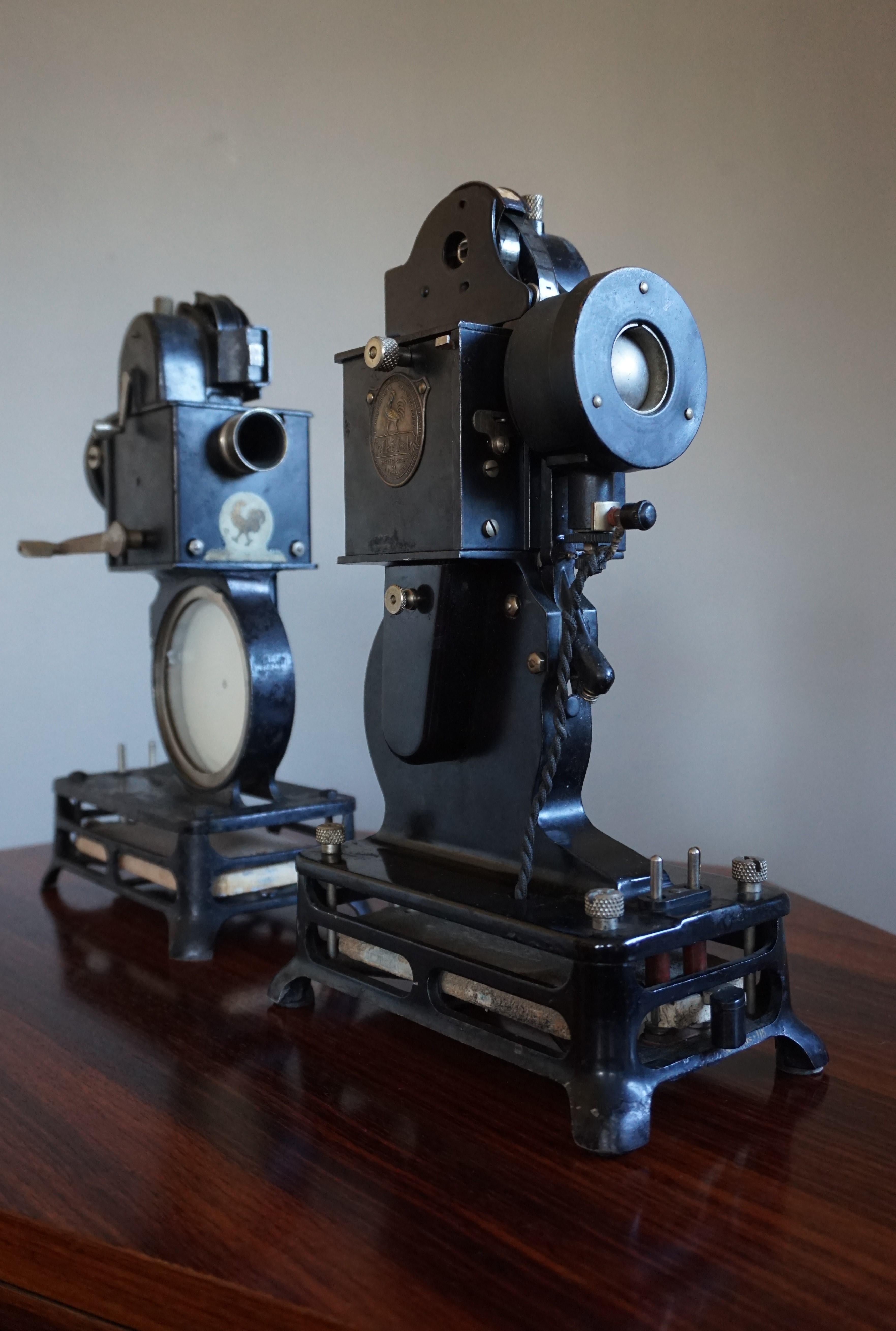 Blackened Decorative Antique Pathé Baby Projector Bookends with Felix the Cat Cartoon Film