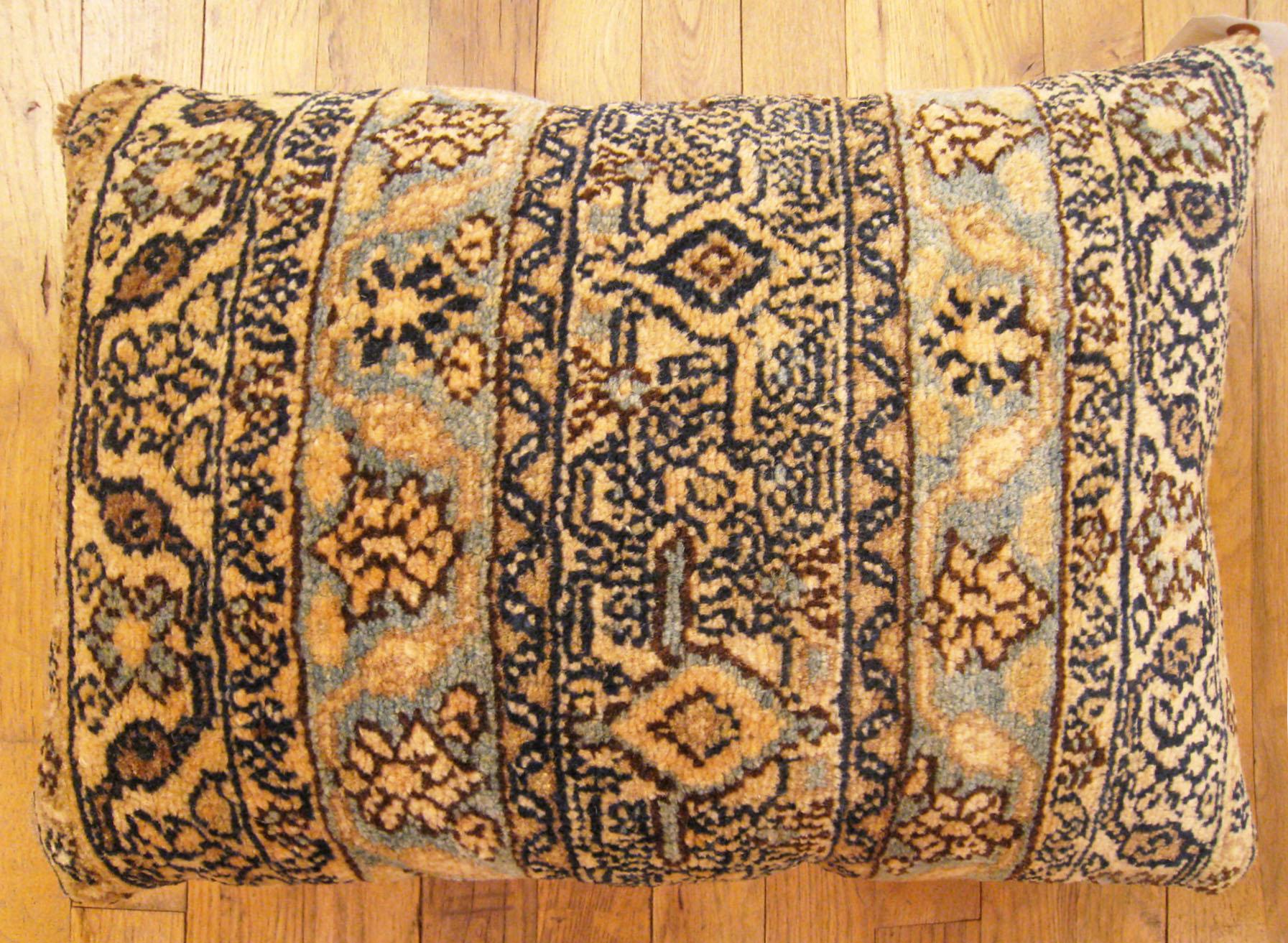 Antique Persian hamadan rug pillow; size 2'0” x 1'6”.

An antique decorative pillow with floral elements allover a beige central field, size 2'0” x 1'6”. This lovely decorative pillow features an antique fabric of a Hamadan rug on front which is