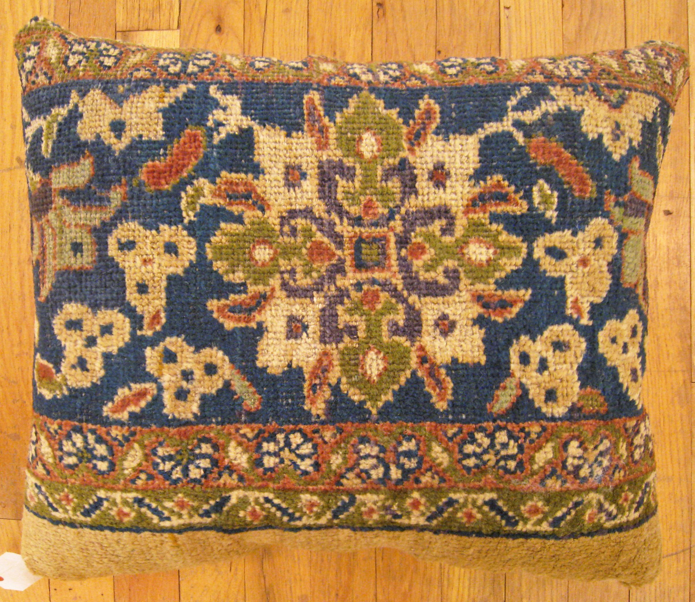 Antique Persian Sultanabad carpet pillow; size 1'10” x 1'6”.

An antique decorative pillow with floral elements allover a camel central field, size 1'10” x 1'6”. This lovely decorative pillow features an antique fabric of a Sultanabad carpet on