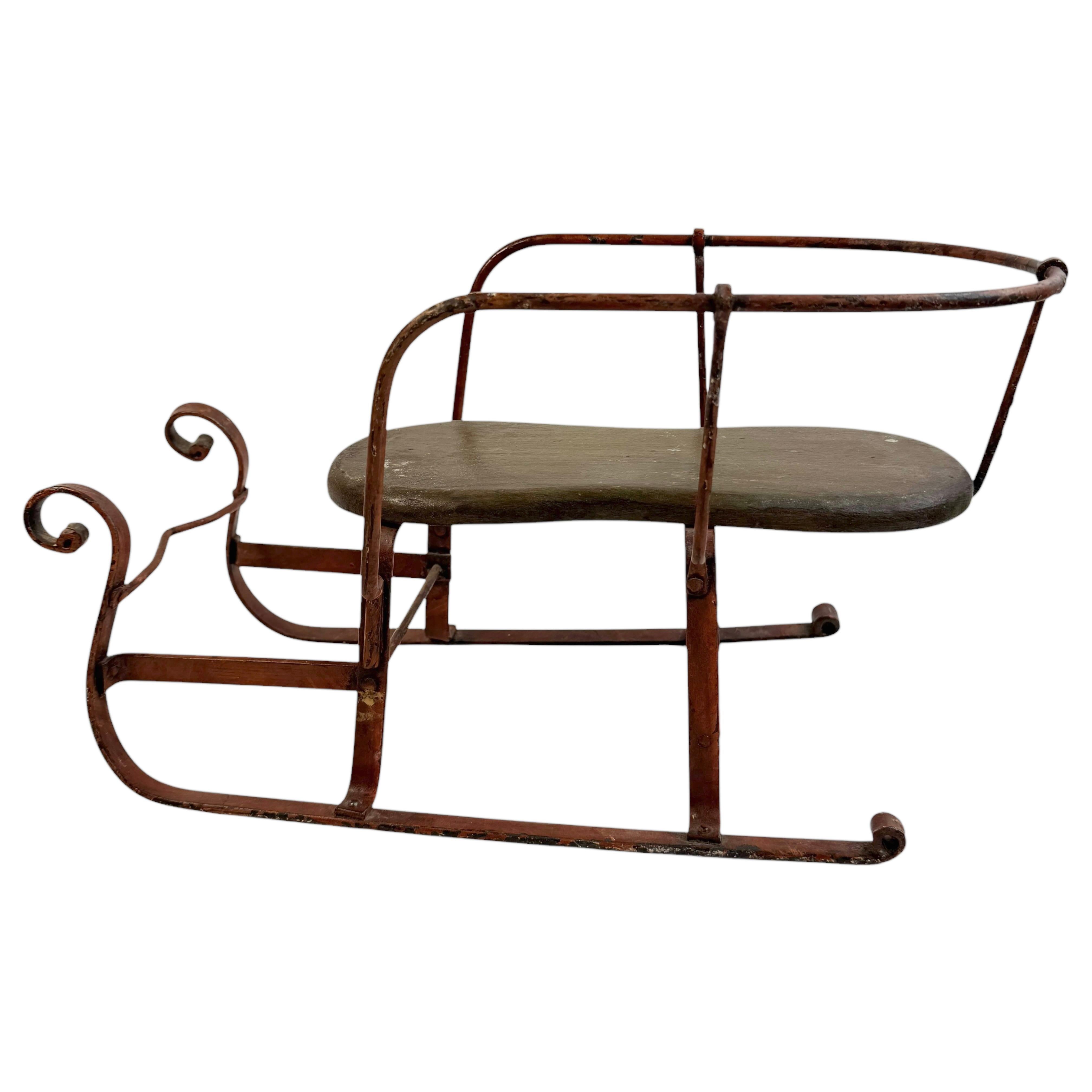Decorative Antique Sled, Wrought Iron with a Wood Seat, German 1910s In Good Condition For Sale In Nuernberg, DE